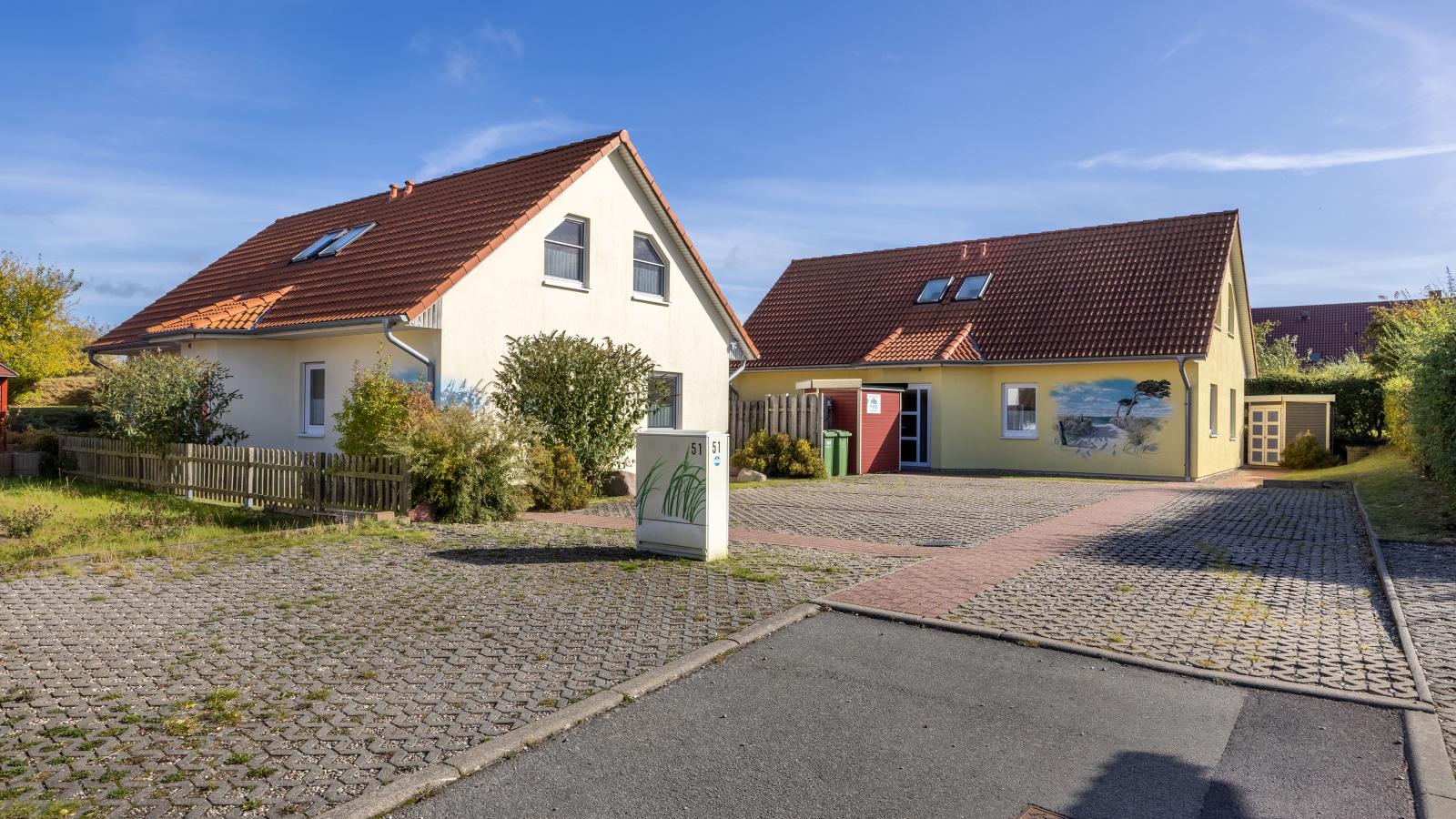 Stranddistel links mit Sauna-Buitenkant zomer
