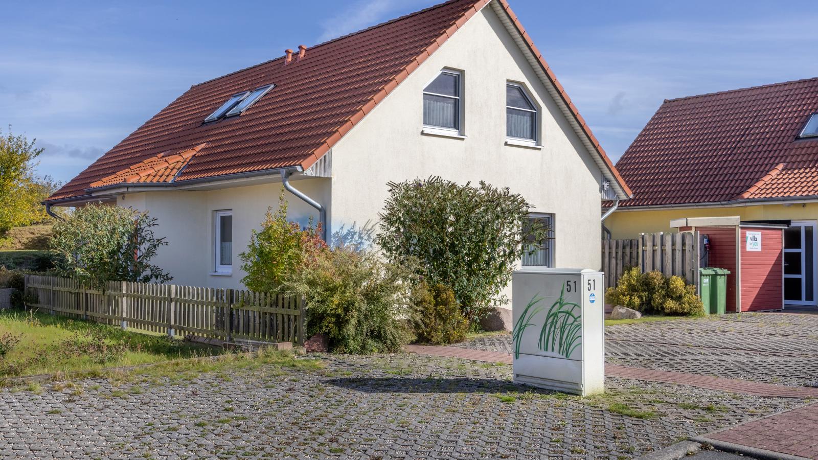 Stranddistel links mit Sauna-Buitenkant zomer