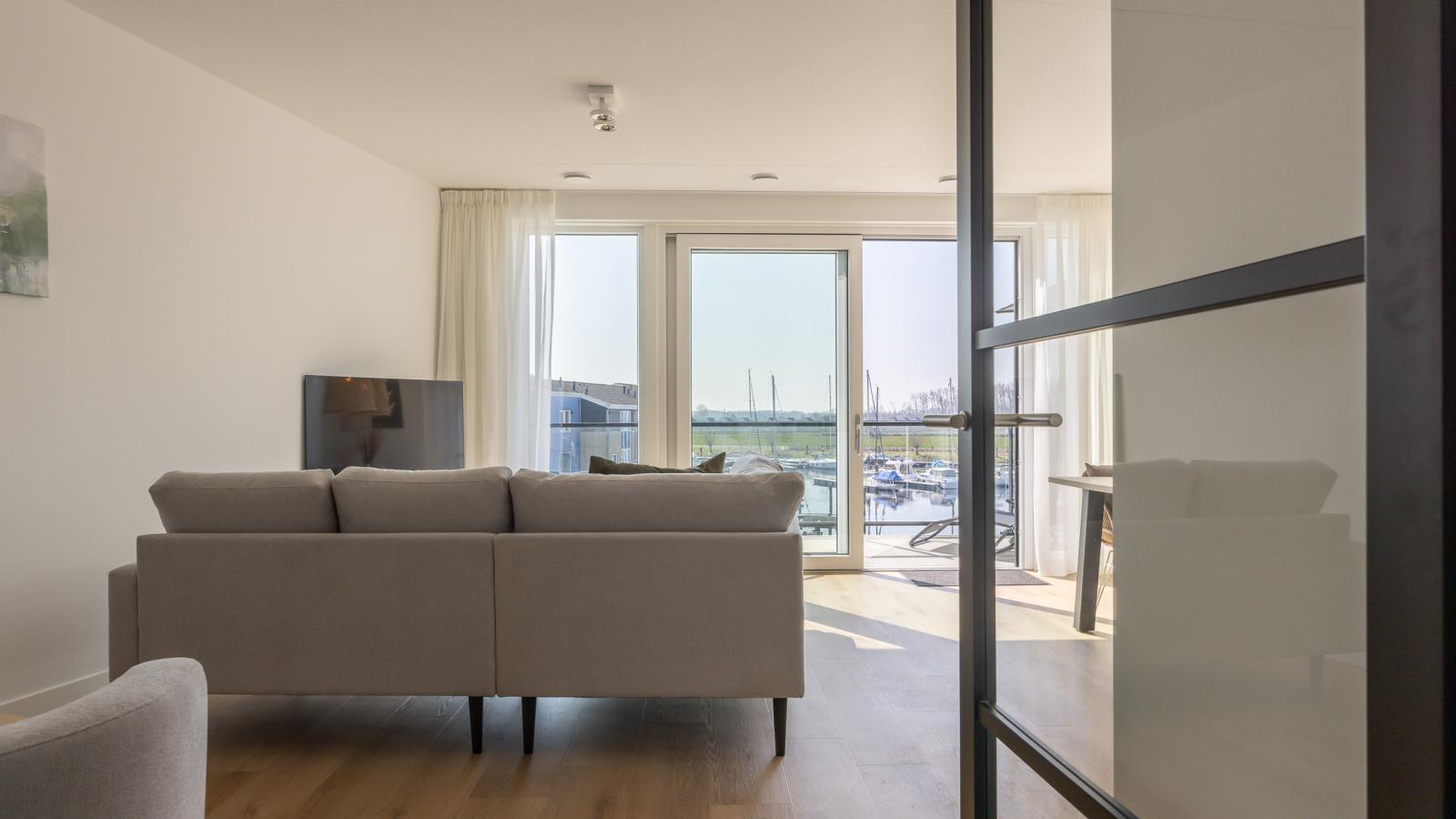 Panorama Appartement Kortgene - Woonkamer