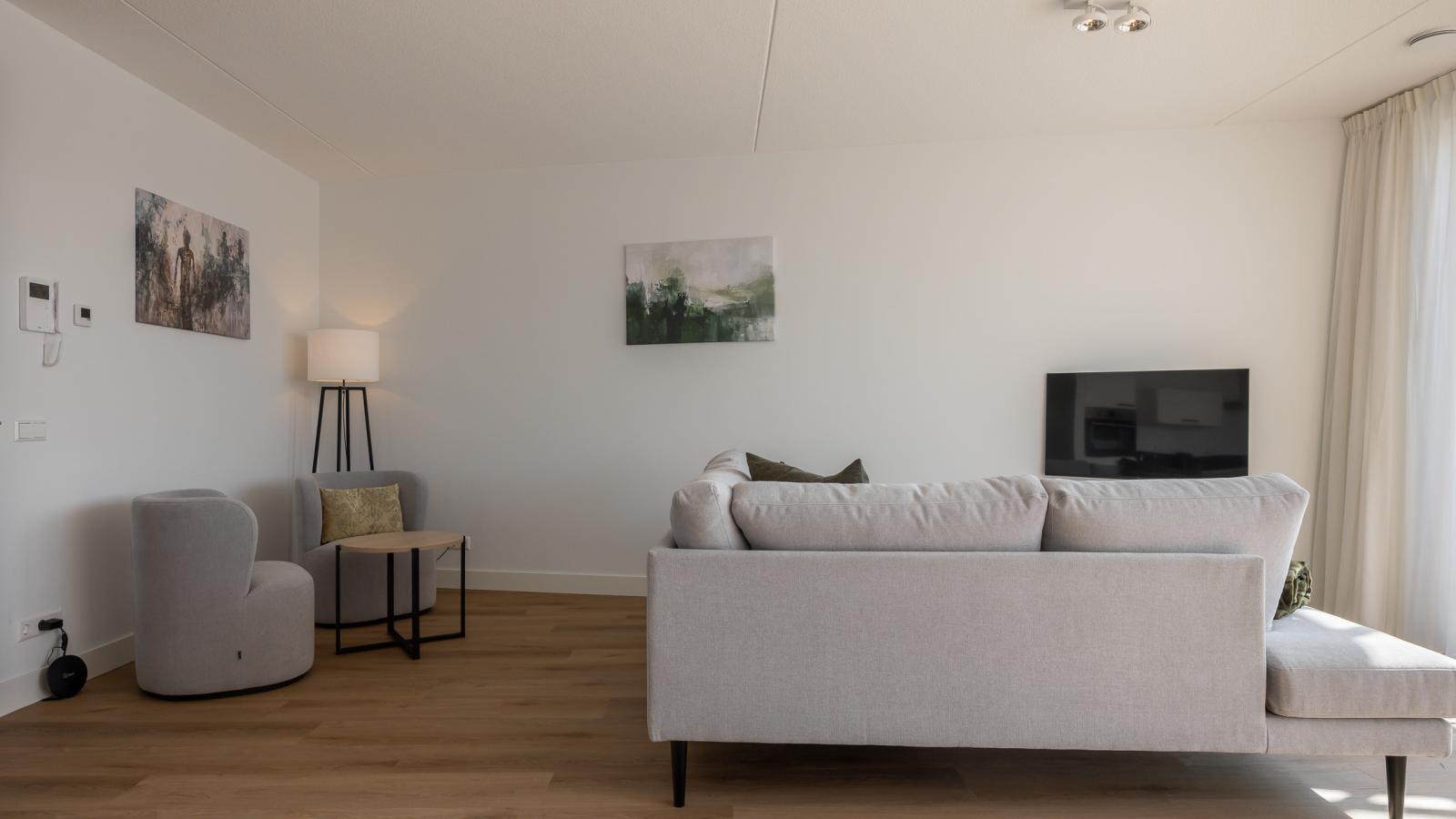 Panorama Appartement Kortgene - Woonkamer