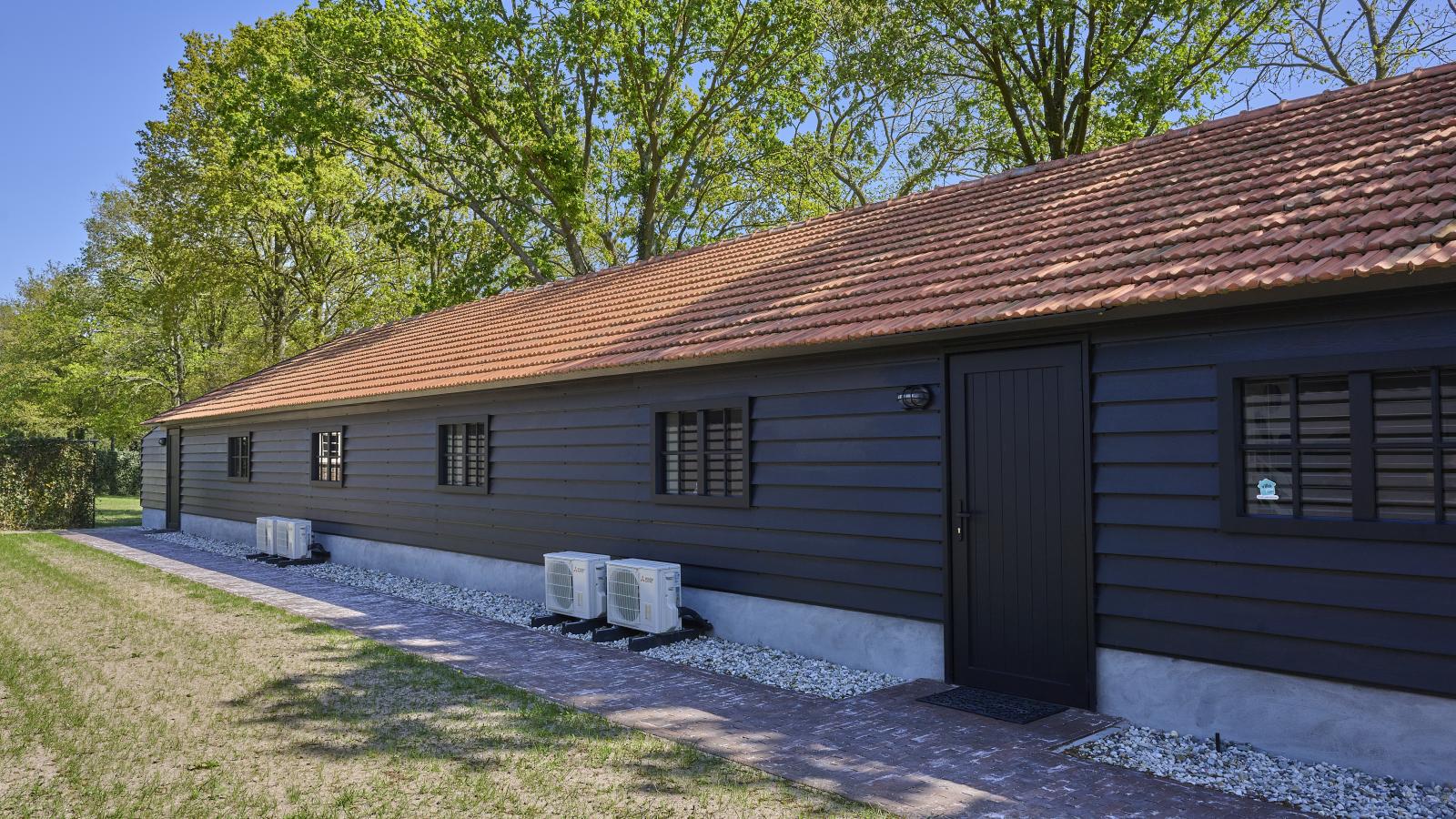 Guesthouse het Koetshuis - Vue d'été
