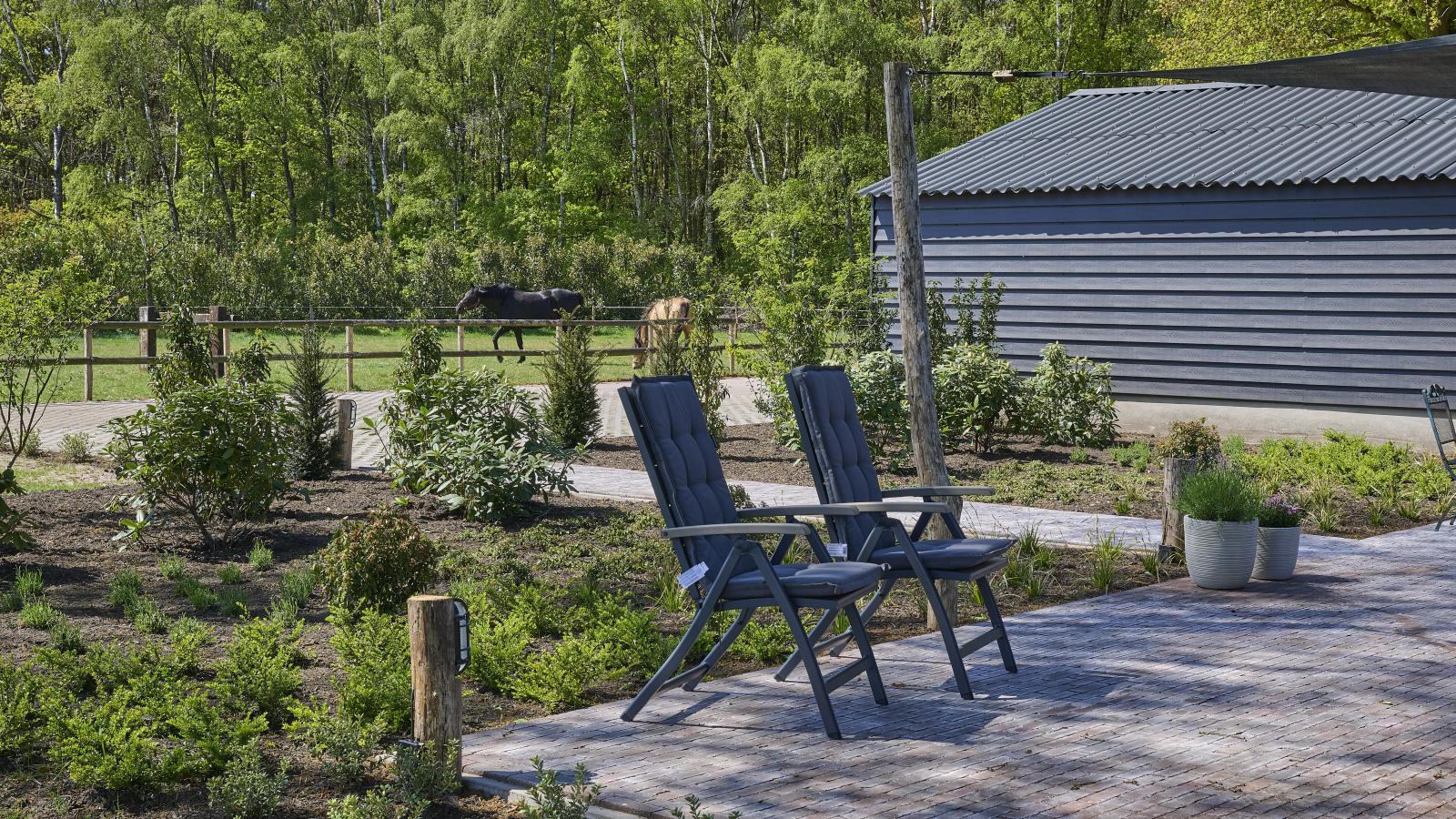 Guesthouse het Koetshuis - Jardins en été