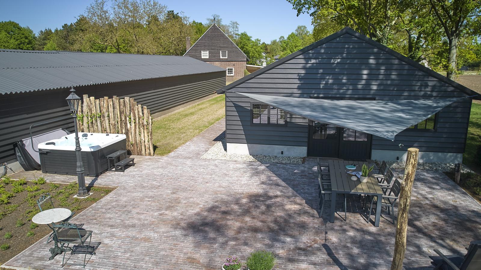 Guesthouse het Koetshuis - Jardins en été