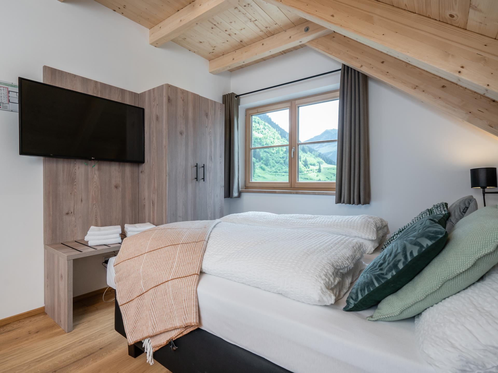 Luxe chalet voor 9 personen met sauna en hottub direct aan de piste - foto 15