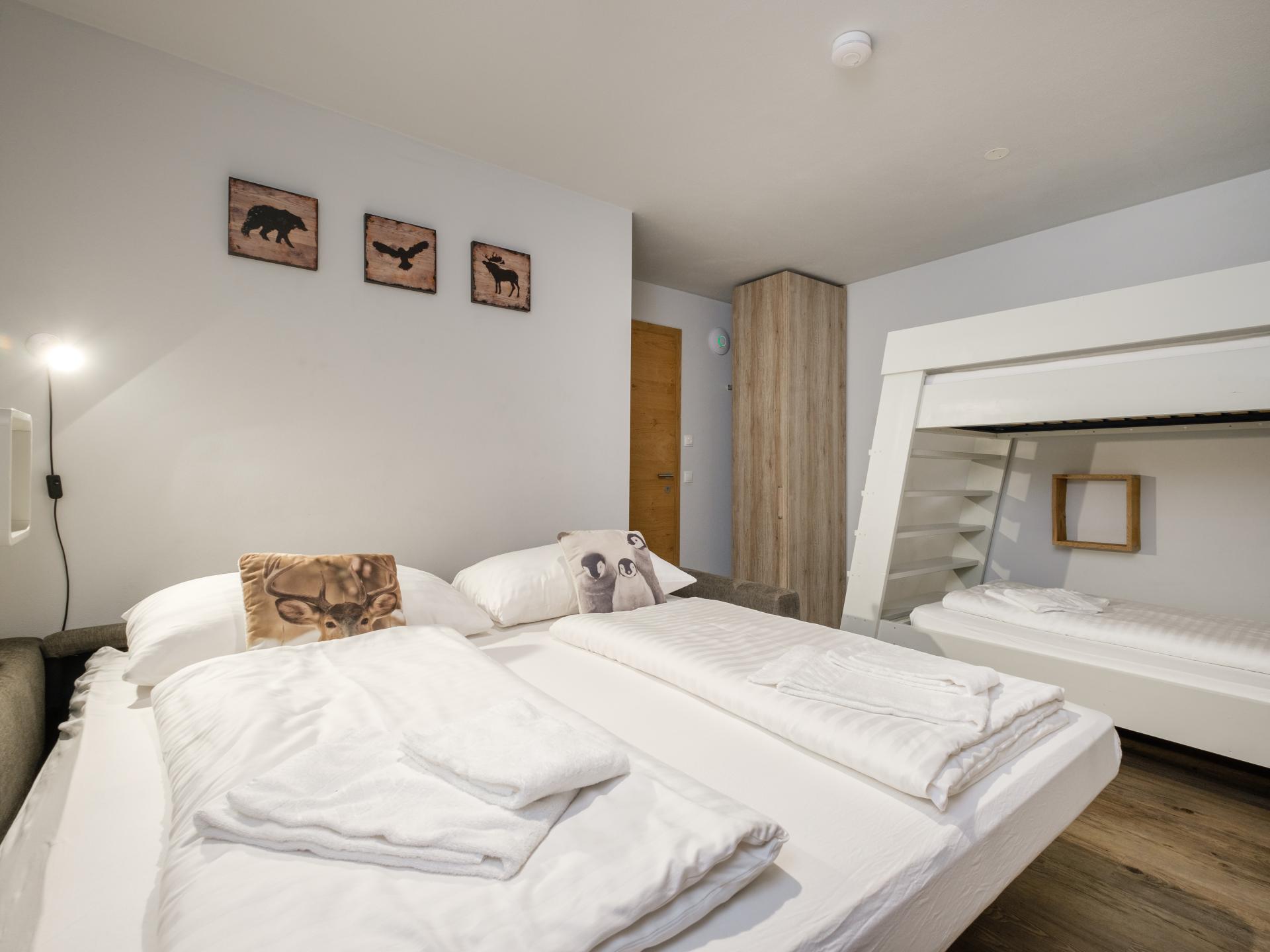 Aan de piste: Luxe vakantiehuis met buitensauna in Leogang - foto 13
