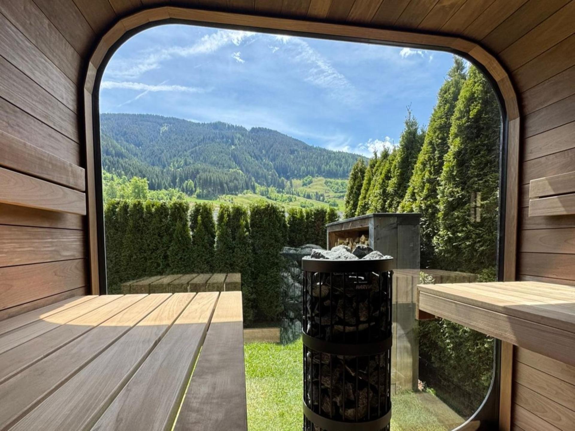 Aan de piste: Luxe vakantiehuis met buitensauna in Leogang - foto 2
