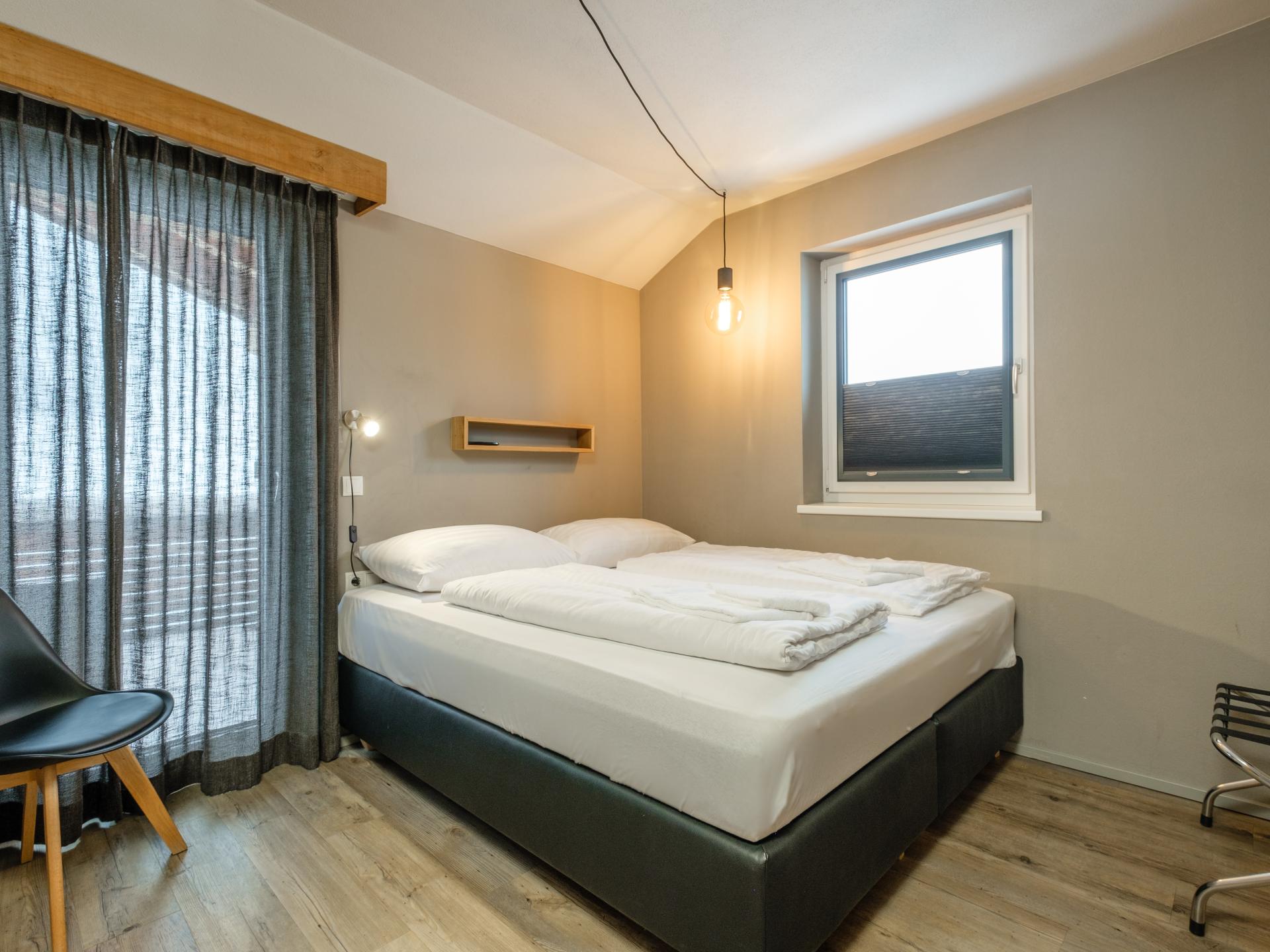 Aan de piste: Luxe vakantiehuis met buitensauna in Leogang - foto 6
