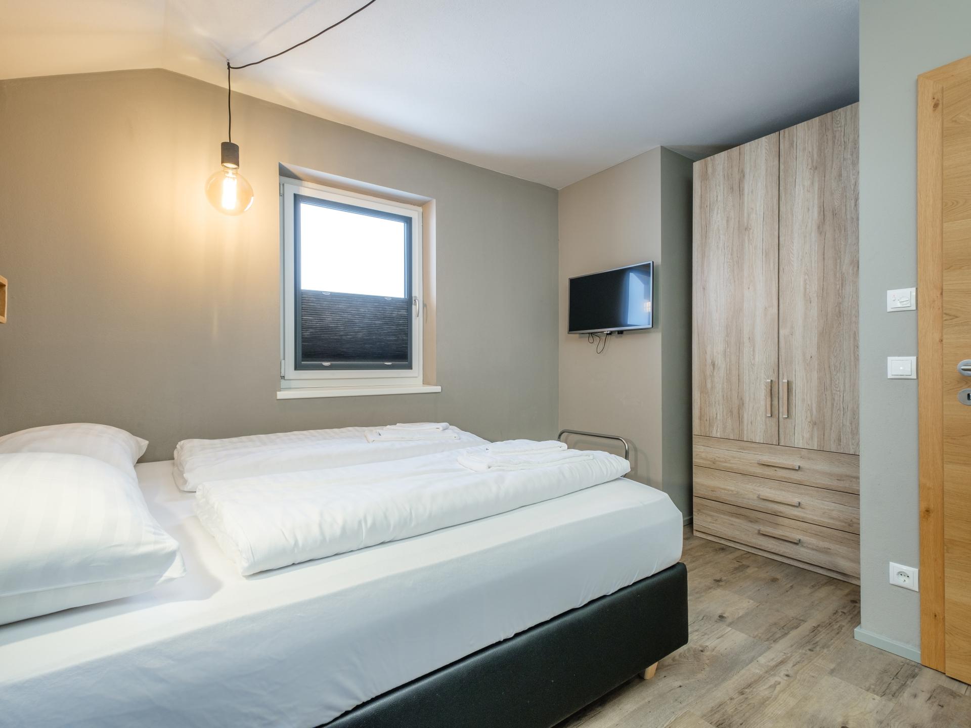 Aan de piste: Luxe vakantiehuis met buitensauna in Leogang - foto 10