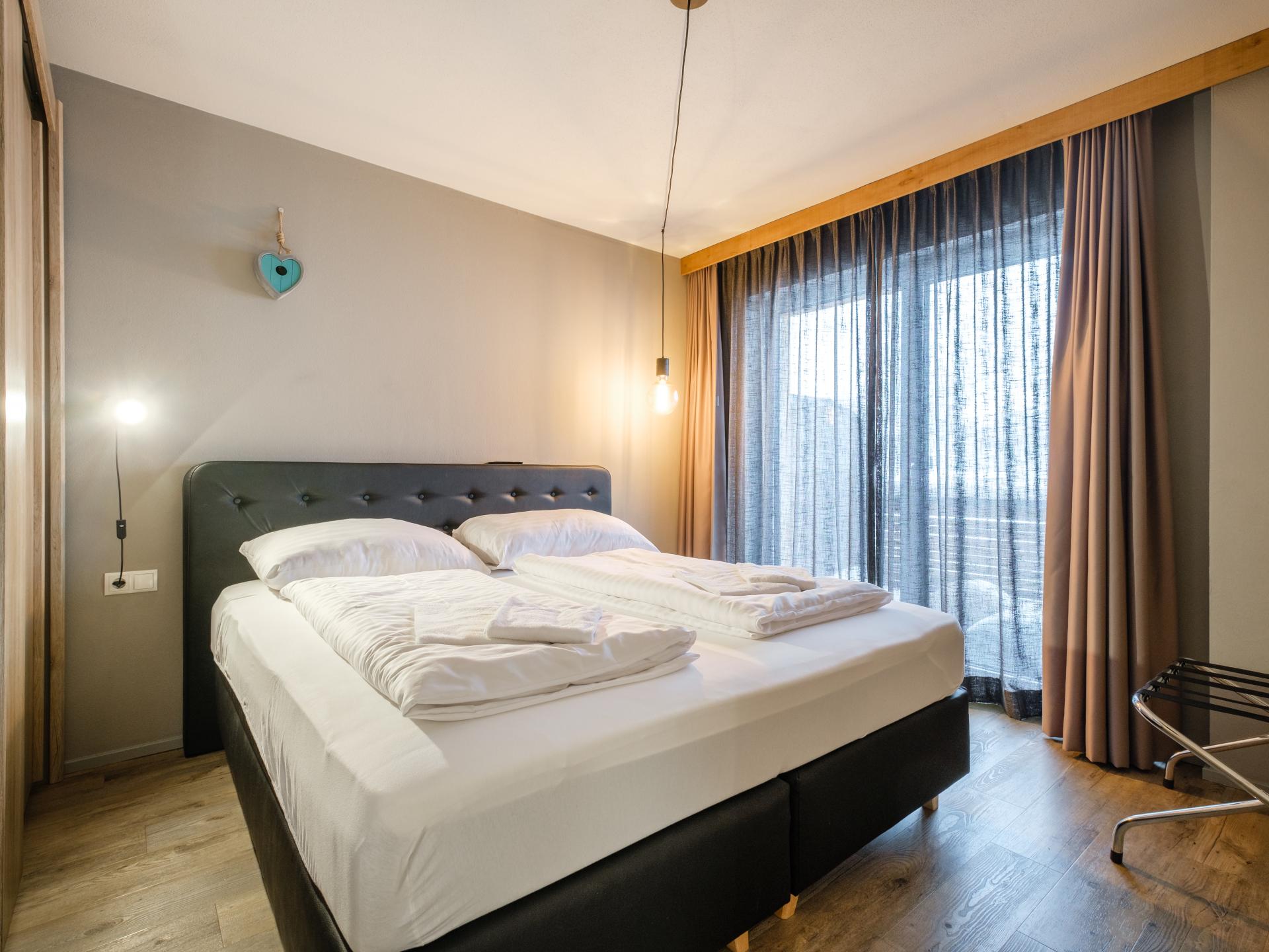 Aan de piste: Luxe vakantiehuis met buitensauna in Leogang - foto 11