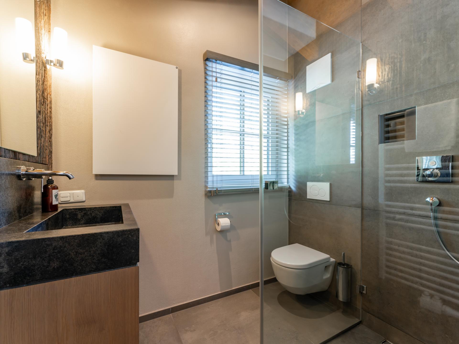 Luxe 12-persoons chalet met sauna op 550m van de skilift in Leogang - foto 23