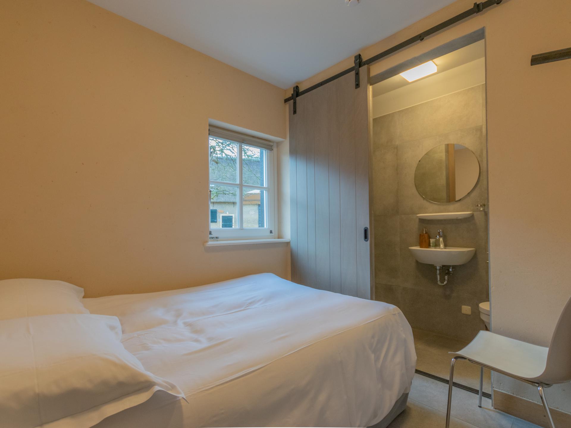 2 luxe vakantiehuizen aan de bosrand voor 24 personen bij Breda - foto 12