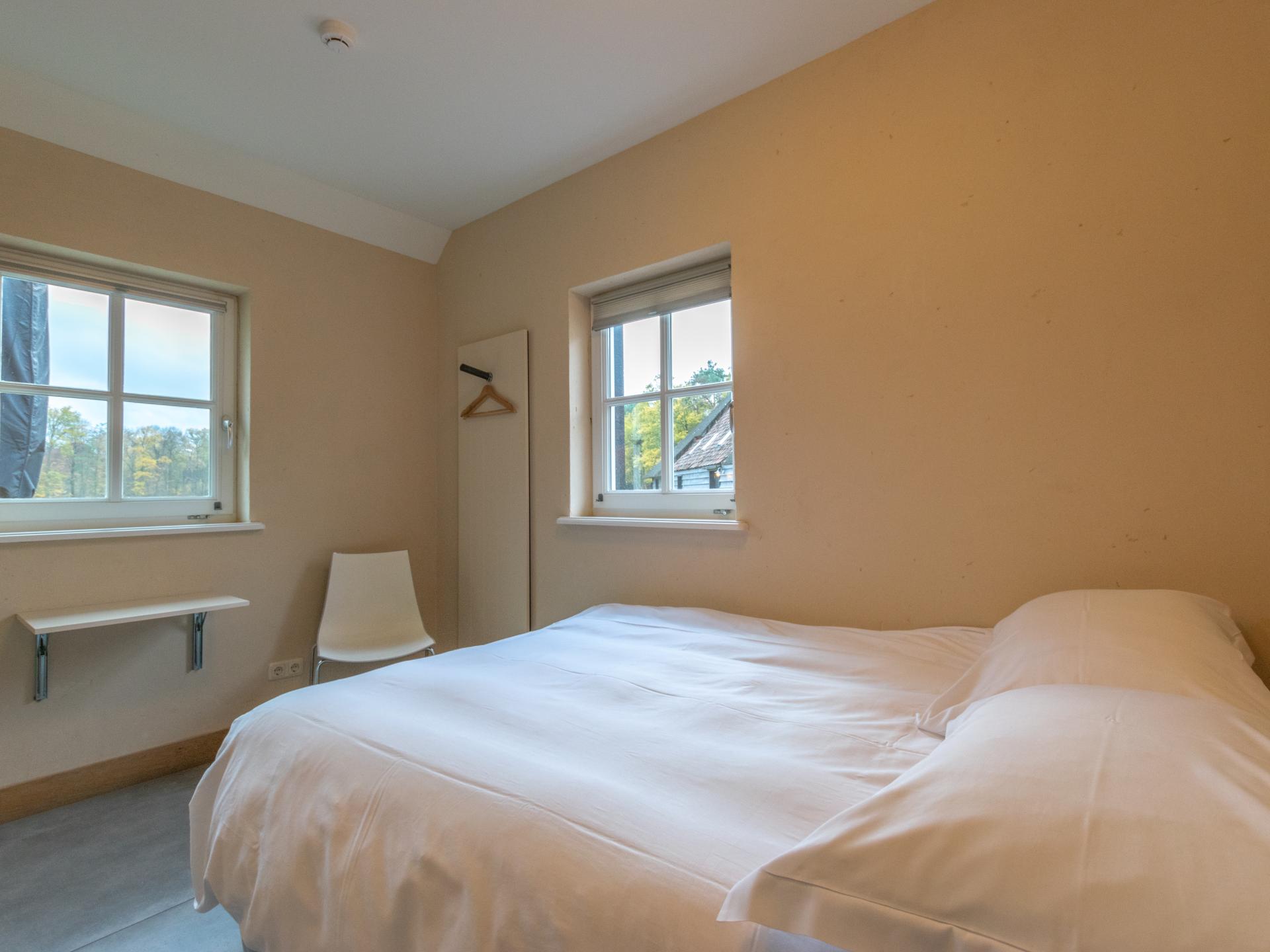 2 luxe vakantiehuizen aan de bosrand voor 24 personen bij Breda - foto 13