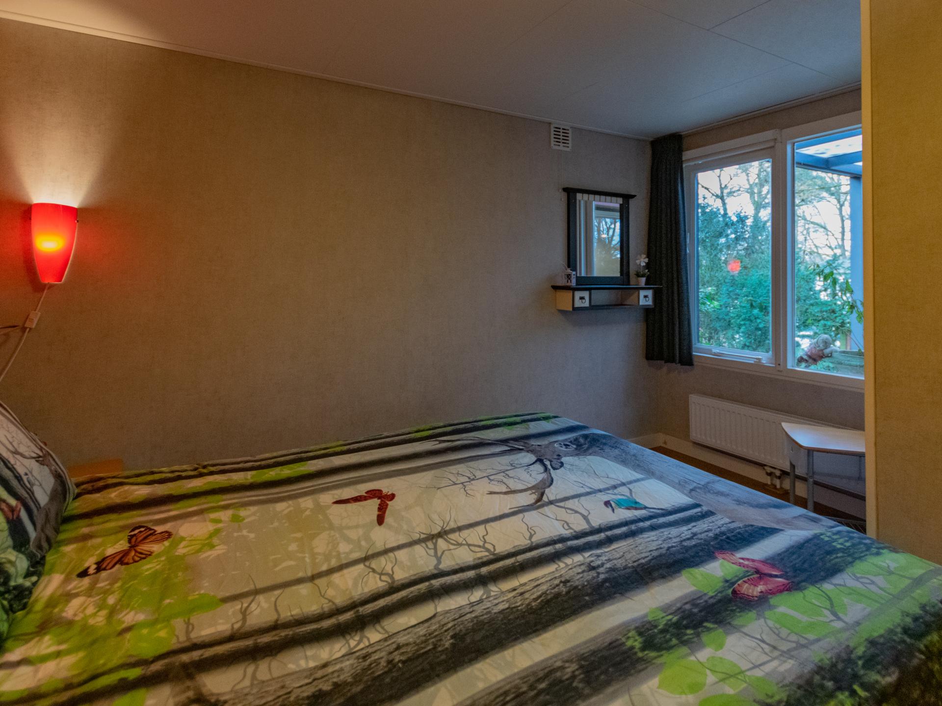 Romantisch boshuis met sauna en uitzicht over de Maashorst - foto 13