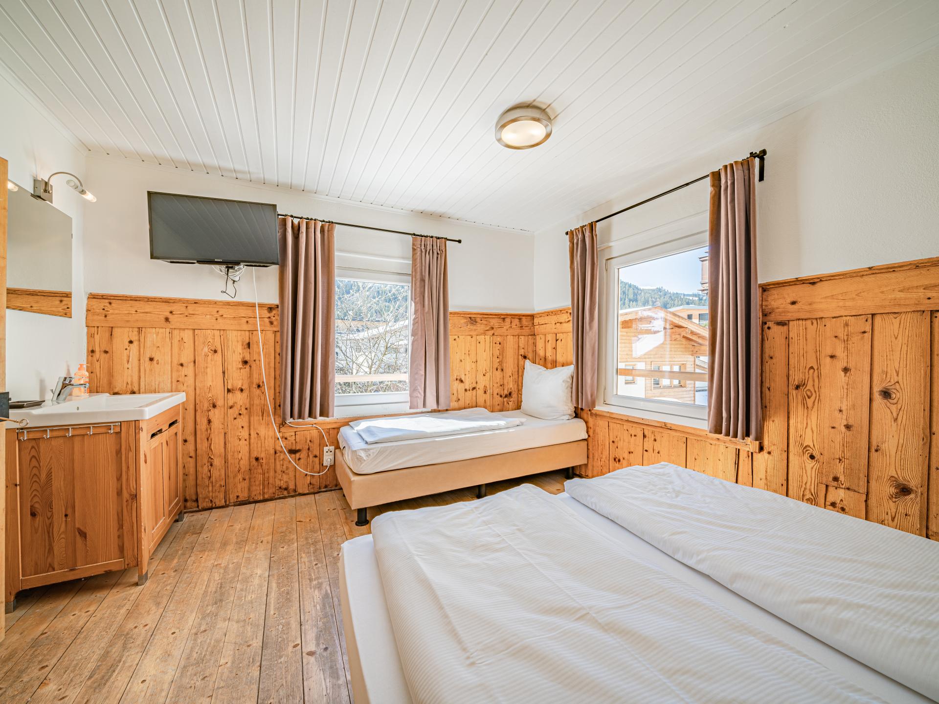 Authentiek chalet voor 14 personen met sauna in het centrum van Kirchberg - foto 13