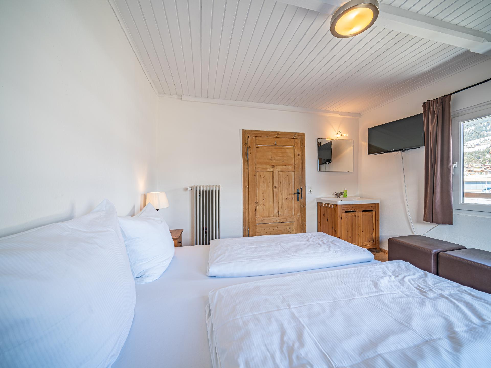 Authentiek chalet voor 14 personen met sauna in het centrum van Kirchberg - foto 16
