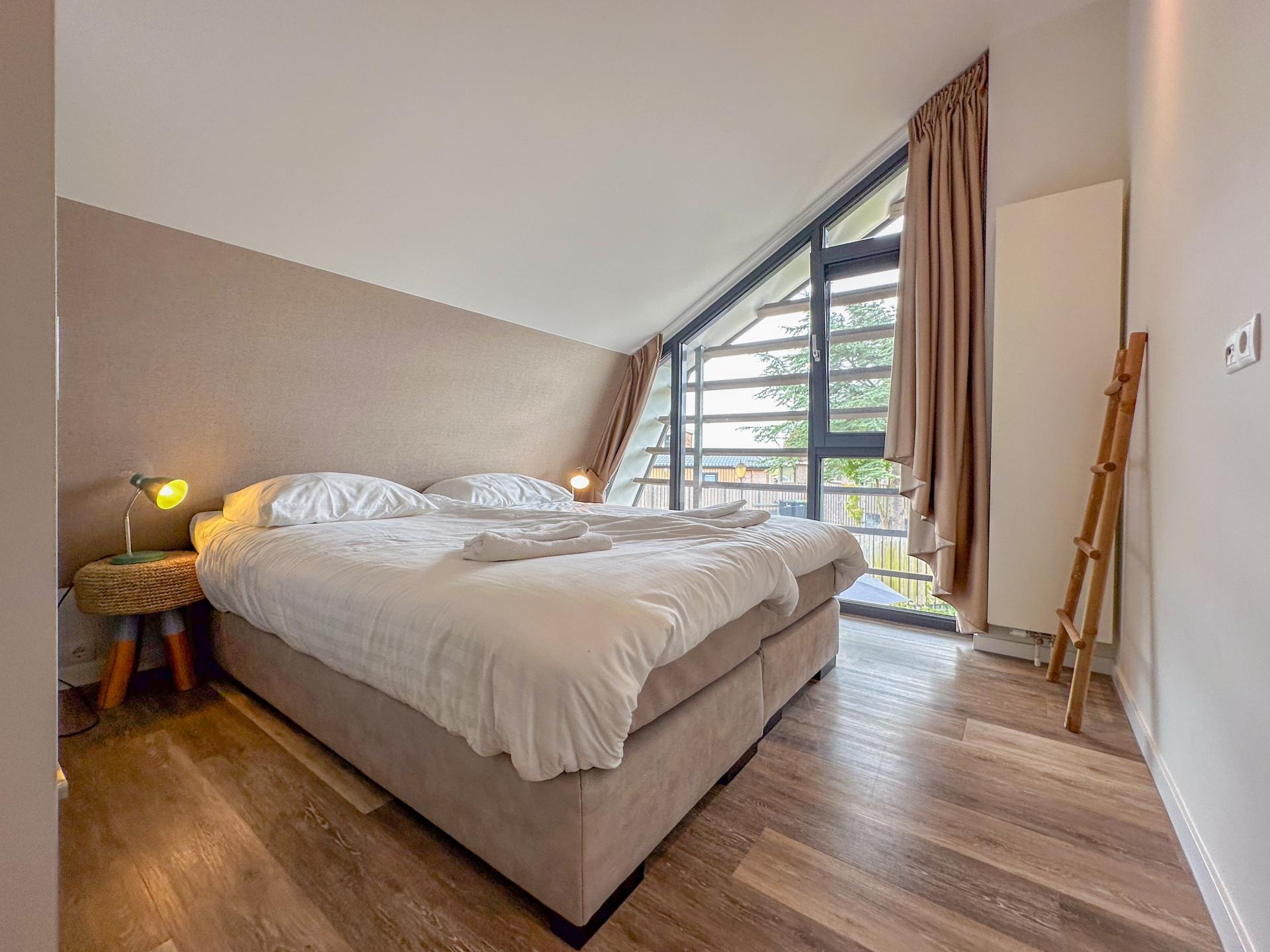 Luxe vakantiewoning met sauna en tuin op rustig park in Egmond - foto 22