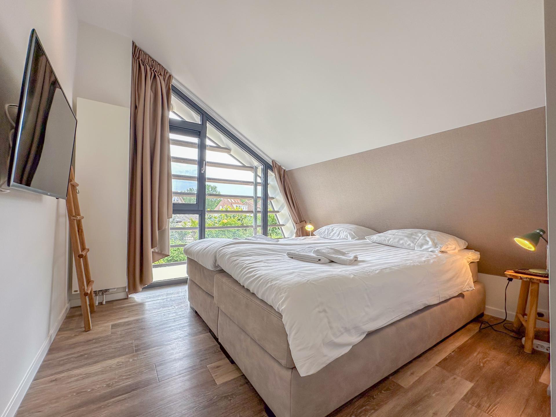 Luxe vakantiewoning met sauna en tuin op rustig park in Egmond - foto 20
