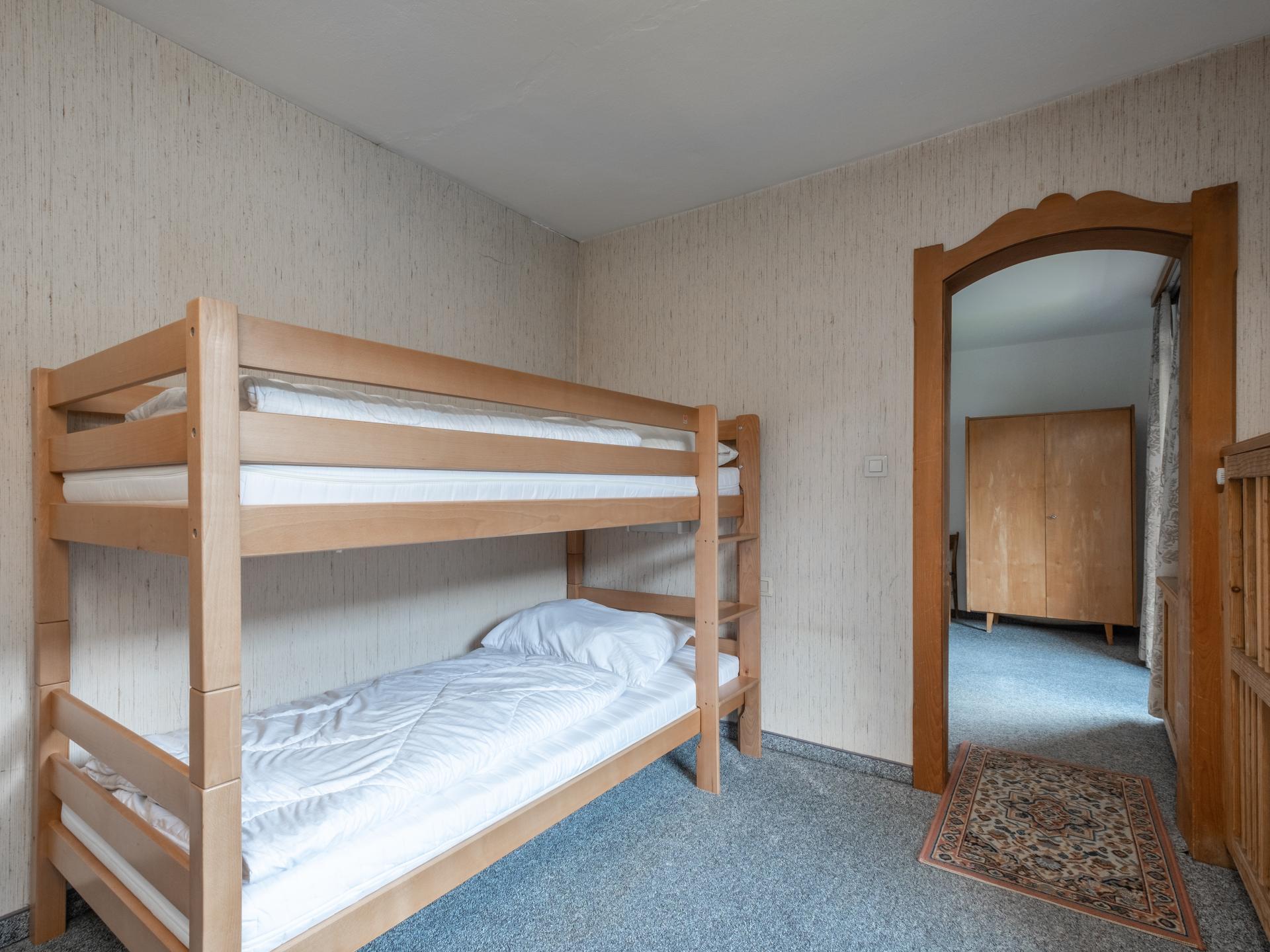 Groepsappartement voor 24 personen aan de bosrand bij het skigebied - foto 12