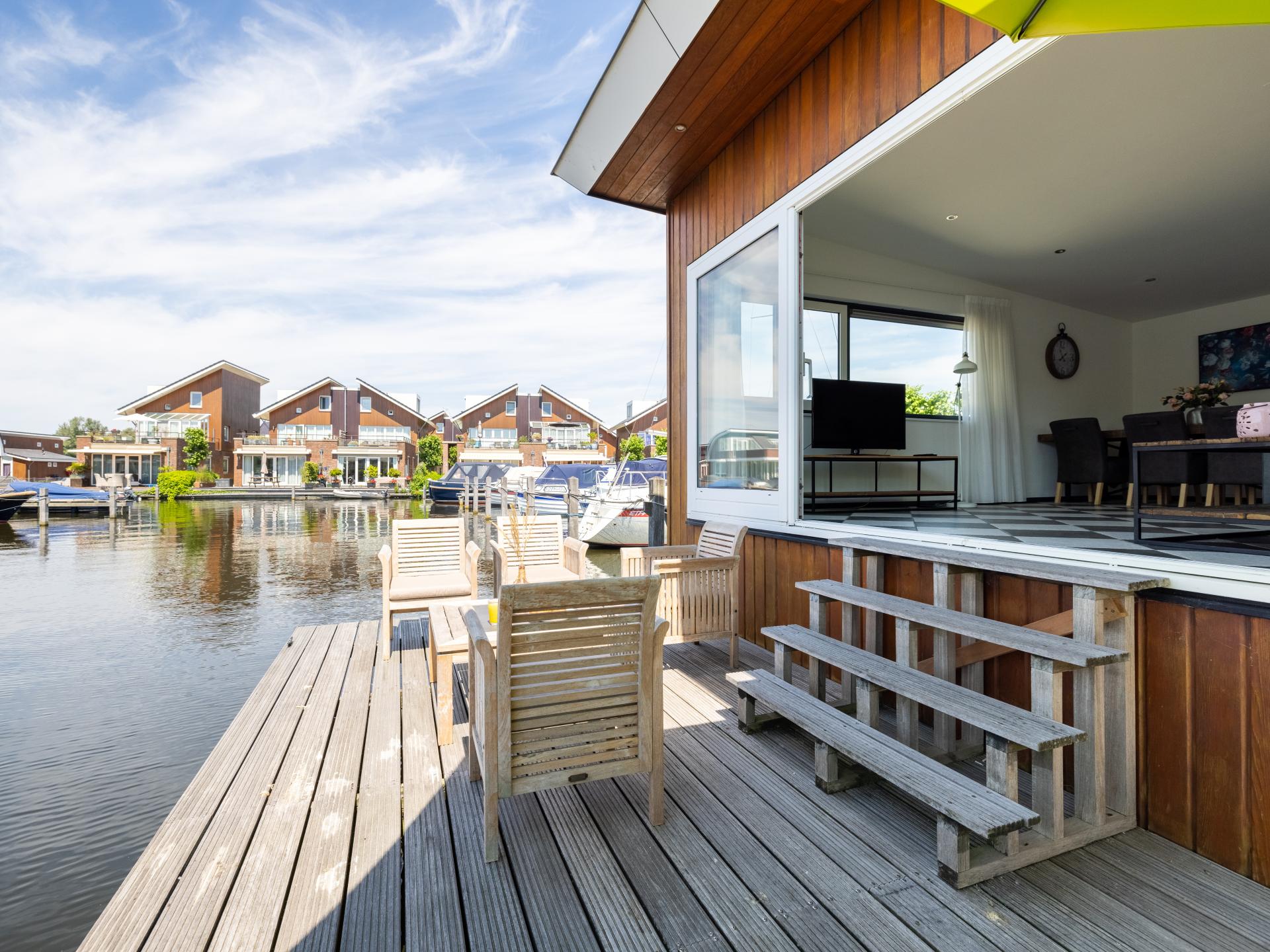 Moderne woonark aan het Uitgeestermeer met terras en jachthaven - foto 26