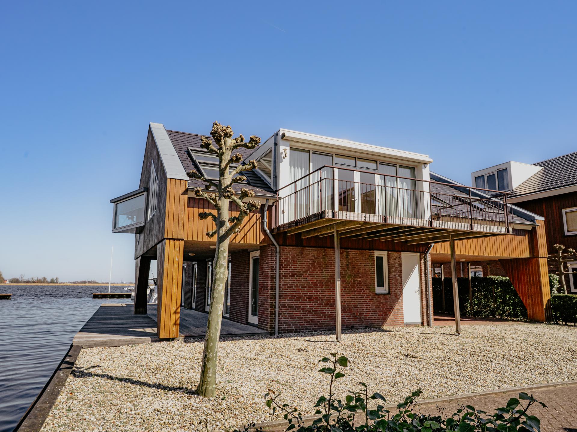 Modern penthouse met panoramisch uitzicht op Uitgeestermeer - foto 32