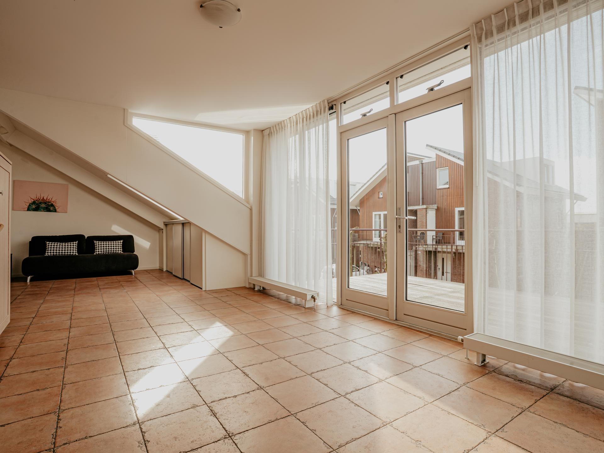 Modern penthouse met panoramisch uitzicht op Uitgeestermeer - foto 23