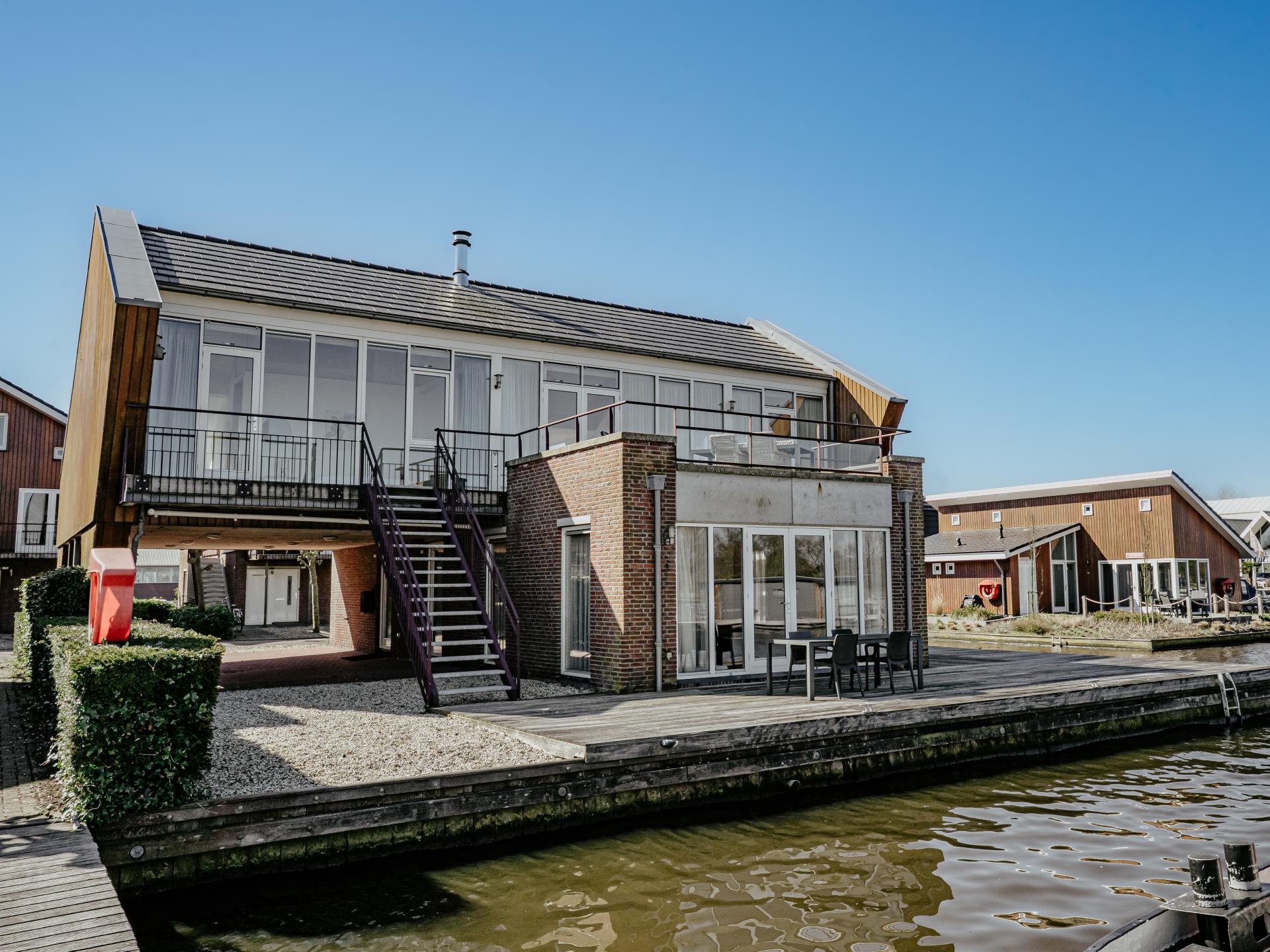 Modern penthouse met panoramisch uitzicht op Uitgeestermeer - foto 33