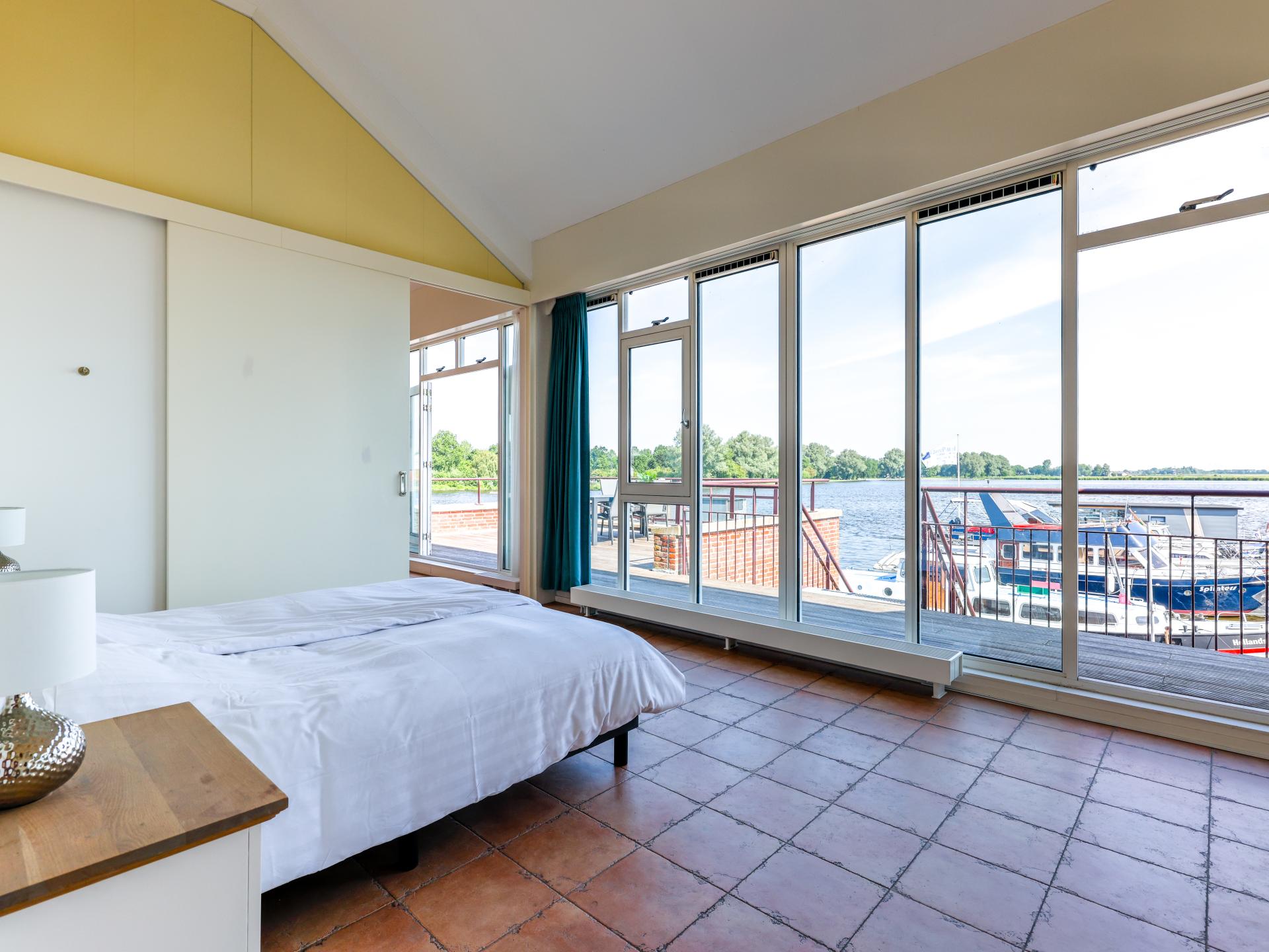 Modern penthouse met panoramisch uitzicht op Uitgeestermeer - foto 15