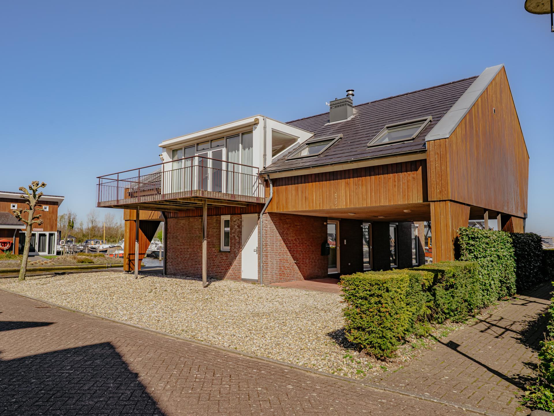 Modern penthouse met panoramisch uitzicht op Uitgeestermeer - foto 31