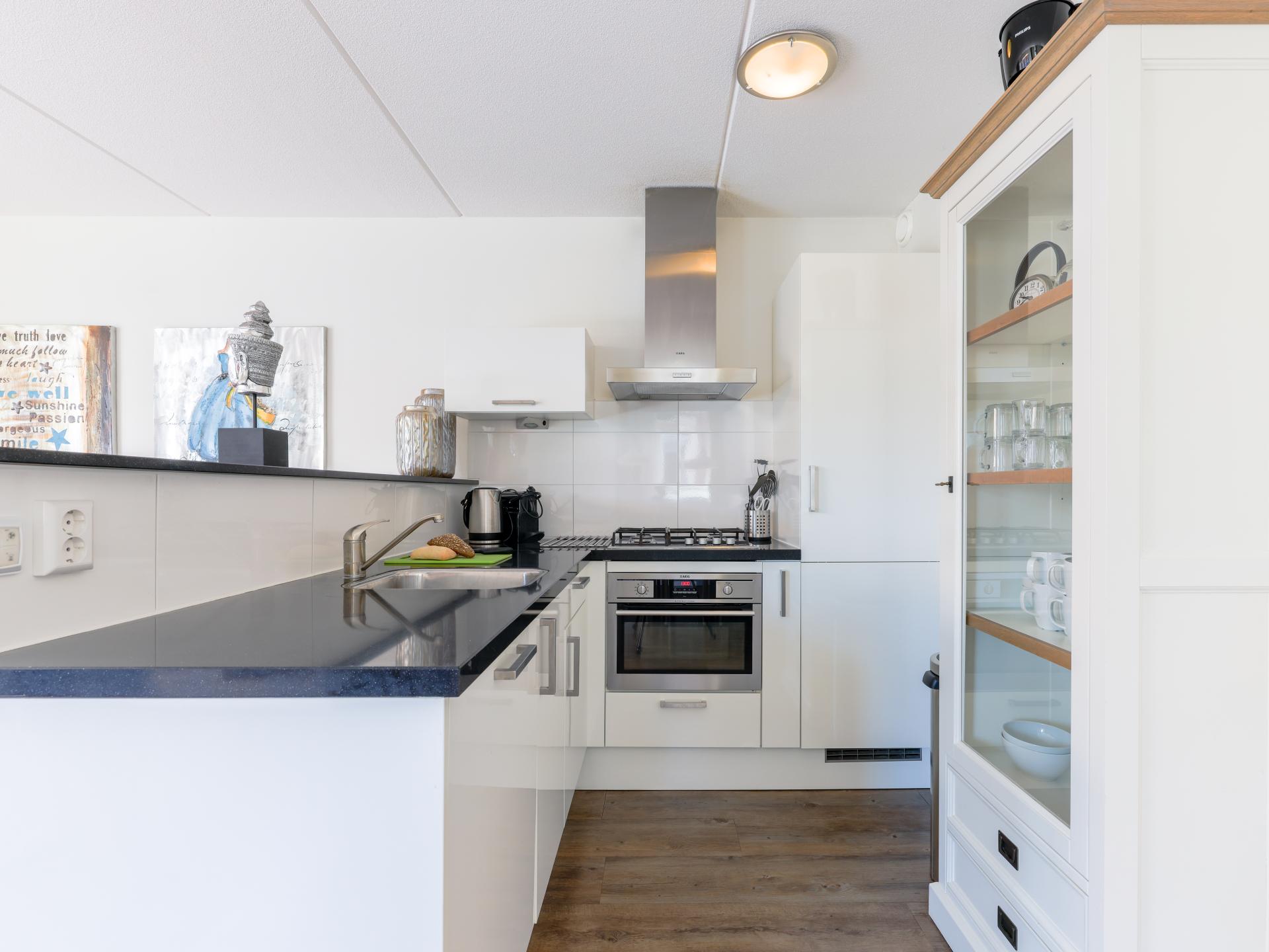 6-persoons appartement aan het meer in Uitgeest met eigen steiger - foto 9