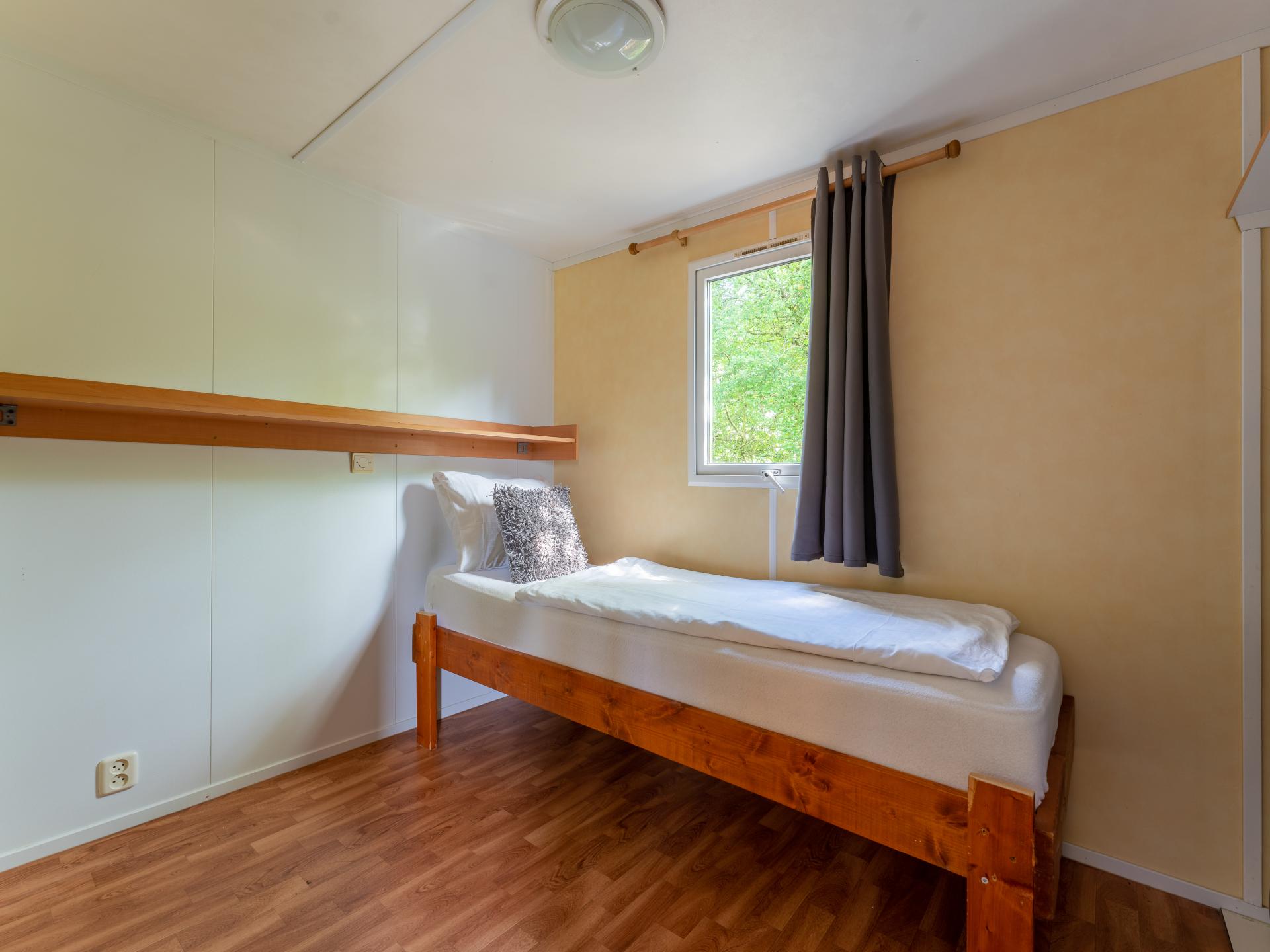Knus chalet met gashaard op de Veluwe, nabij het water - foto 11