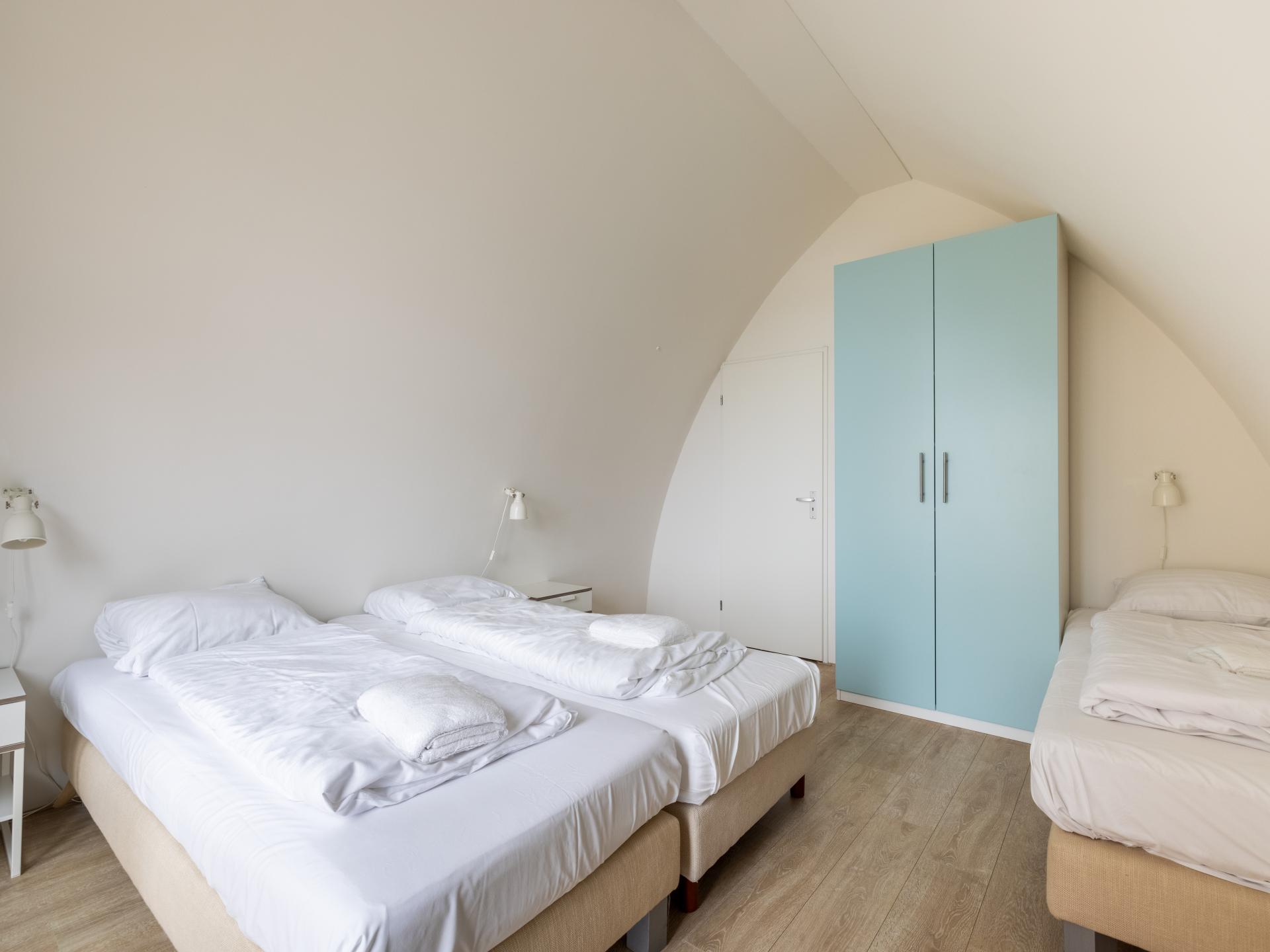 Modern vakantiehuis aan de boulevard van Egmond met zeezicht en terras - foto 15
