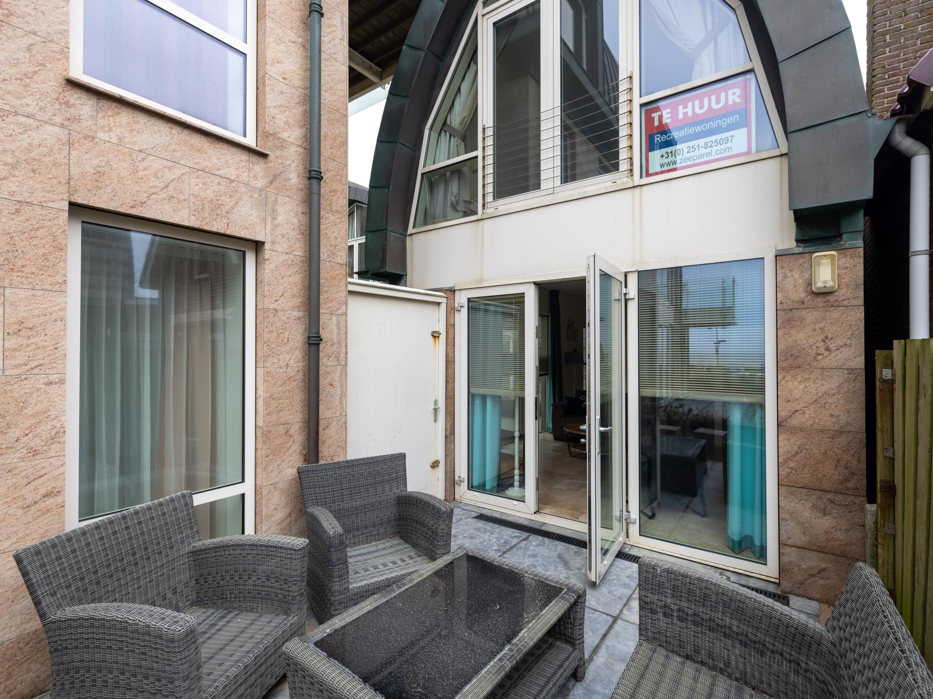 Modern vakantiehuis aan de boulevard van Egmond met zeezicht en terras - foto 19
