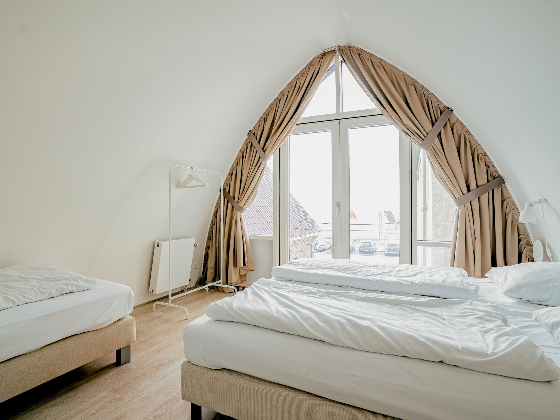 Modern vakantiehuis aan de boulevard van Egmond met zeezicht en terras - foto 14