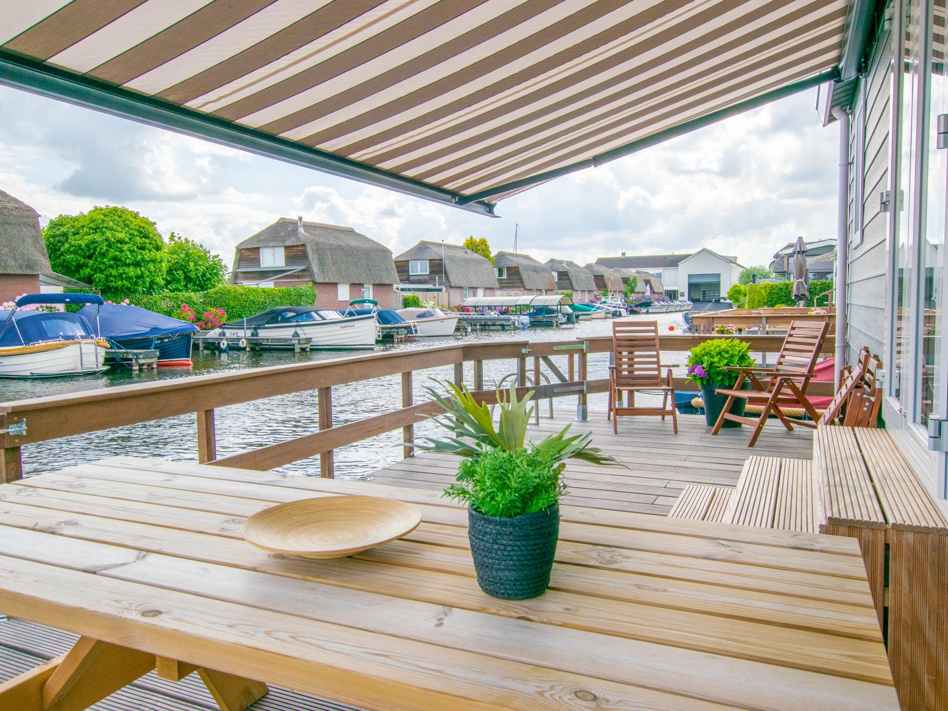 Chalet aan het water met zwemtrap en privéterras in Breukelen - foto 20