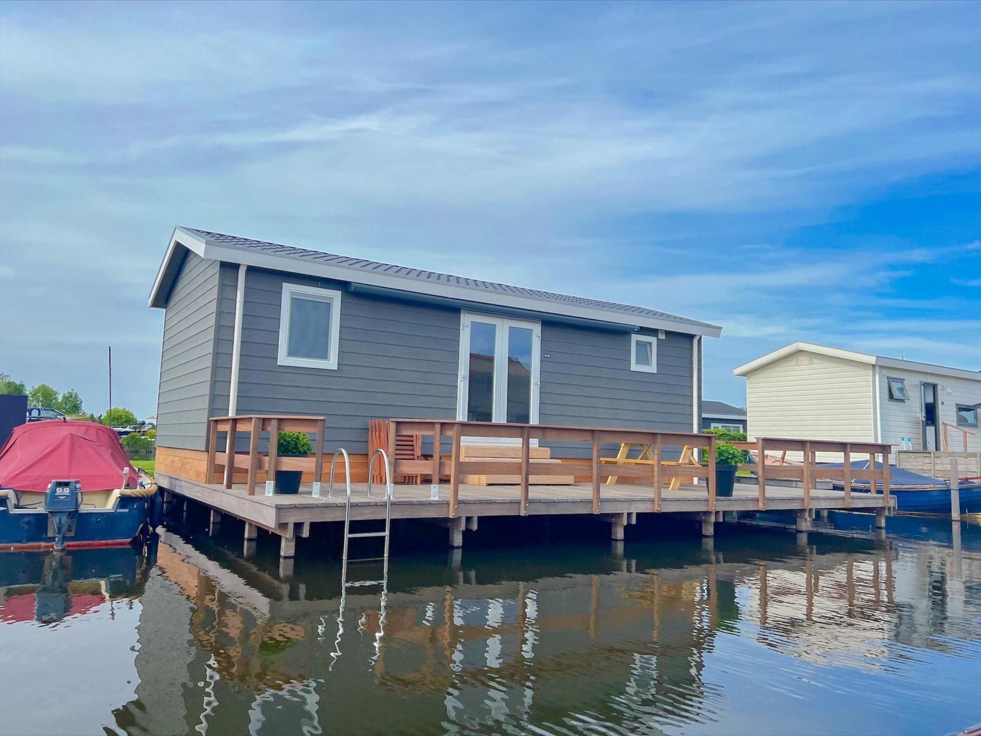 Chalet aan het water met zwemtrap en privéterras in Breukelen - foto 2