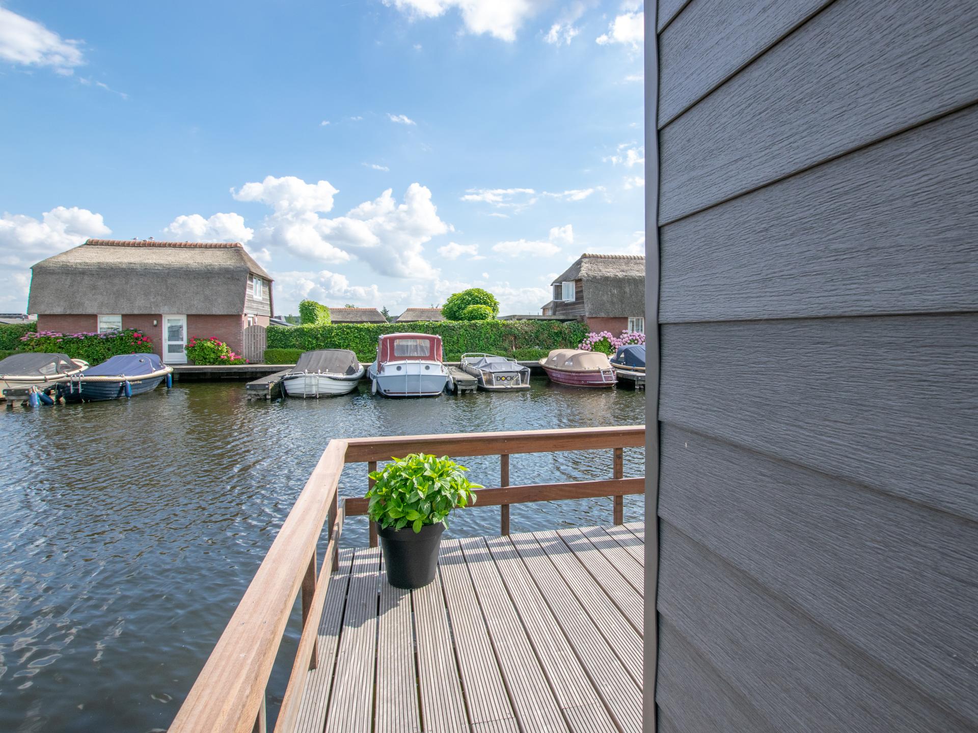 Chalet aan het water met zwemtrap en privéterras in Breukelen - foto 17