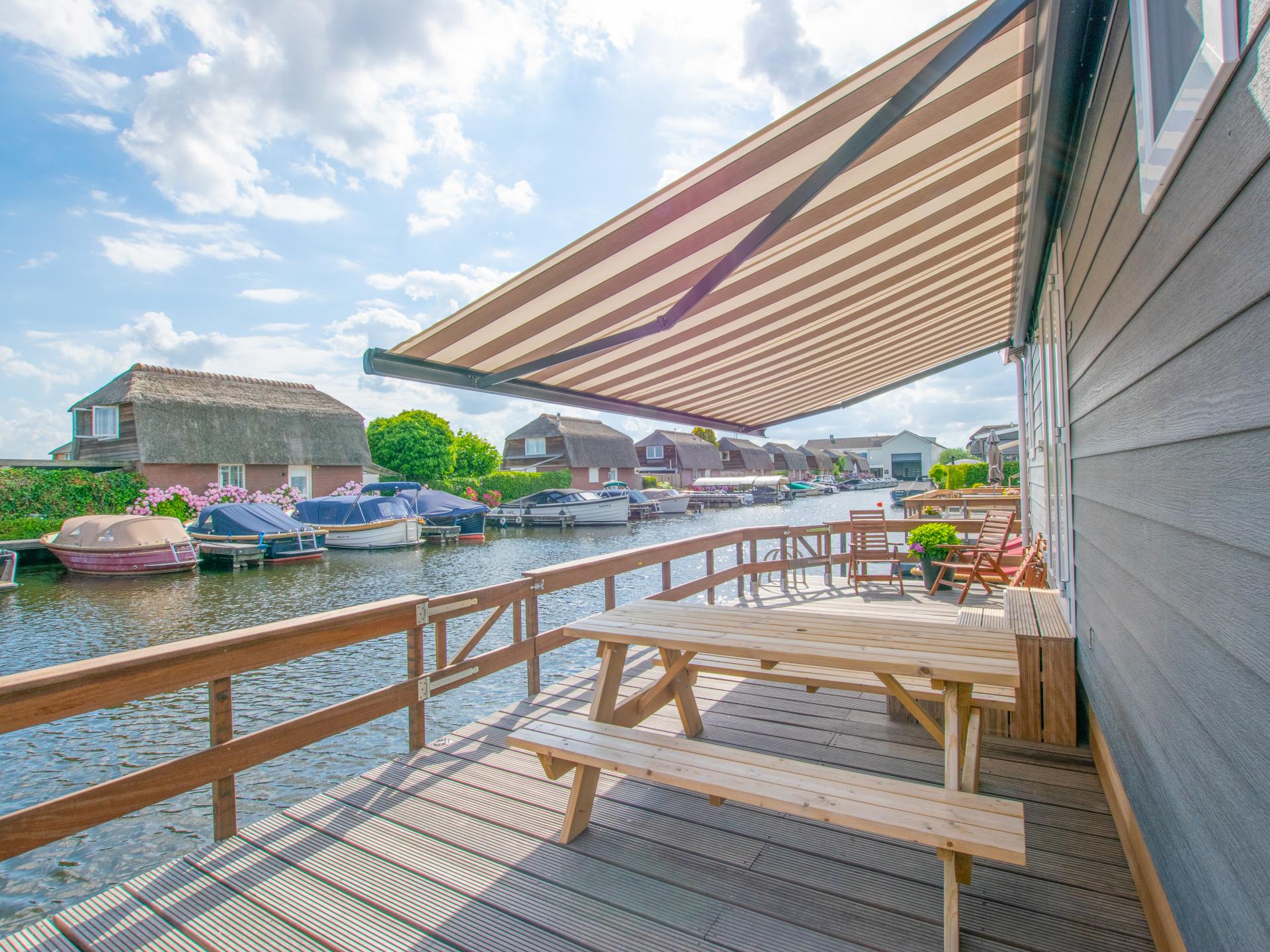 Chalet aan het water met zwemtrap en privéterras in Breukelen - foto 19