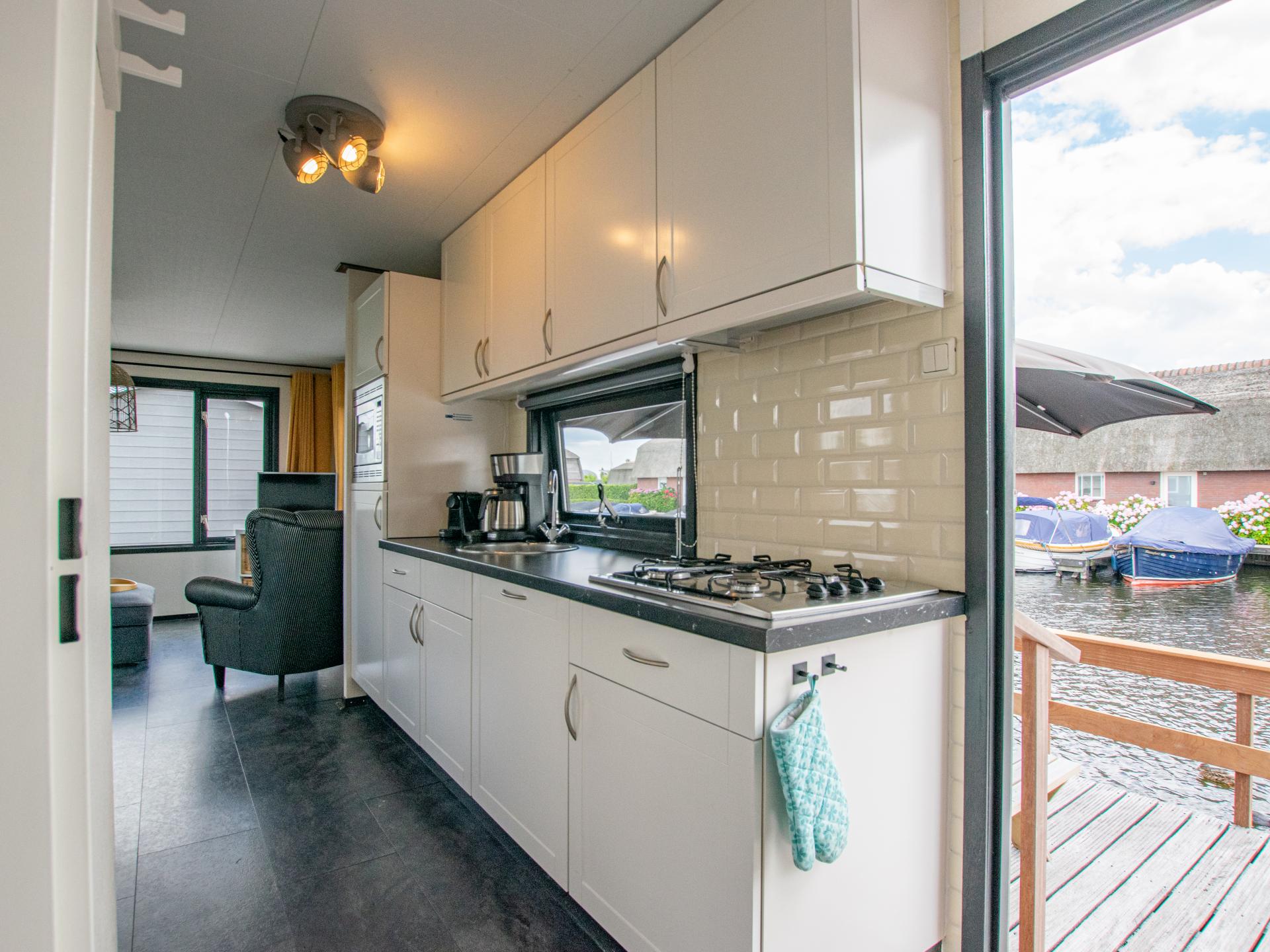 Chalet aan het water met aanlegsteiger in Breukelen, 33m², 2 slaapkamers - foto 12