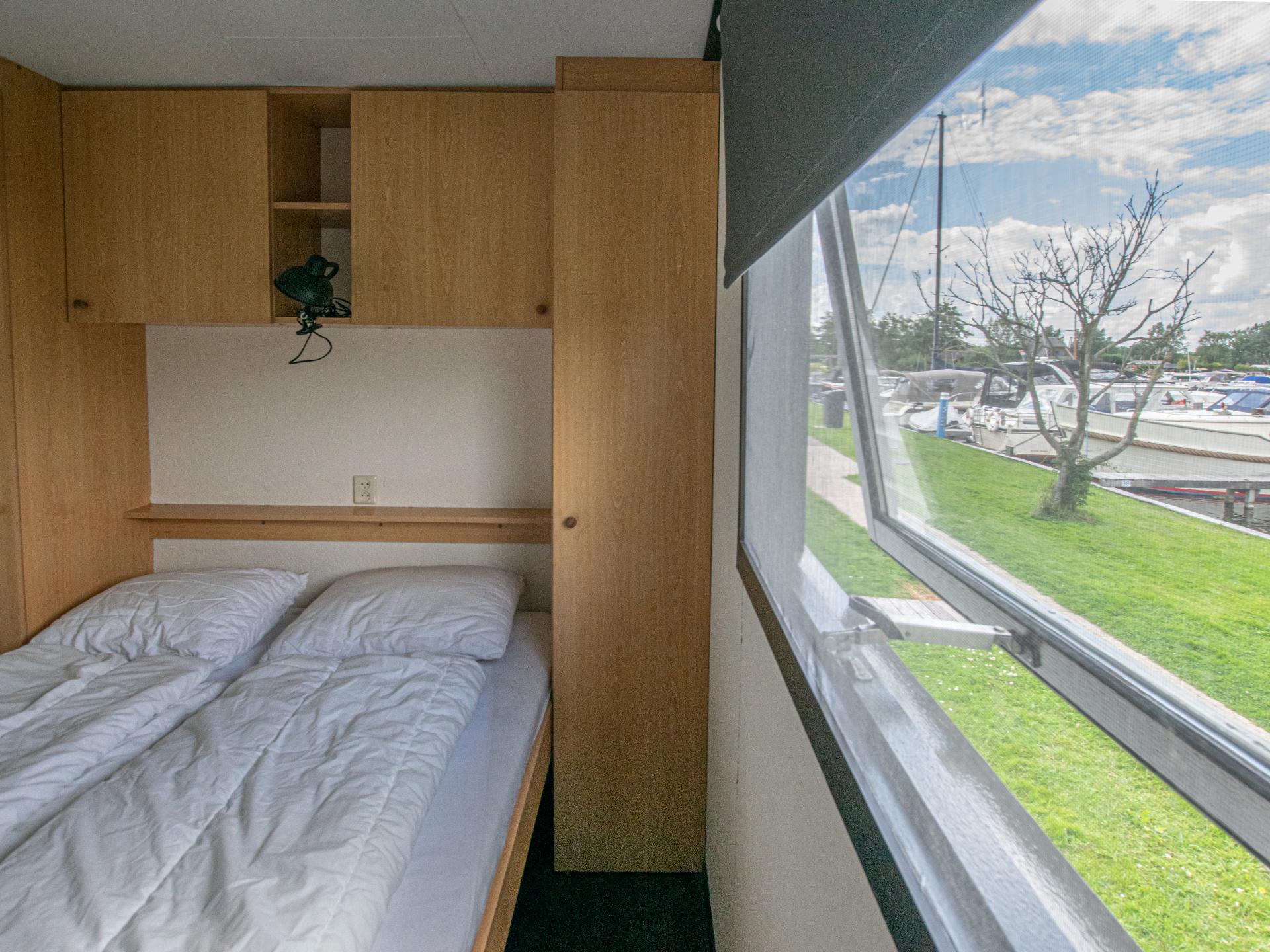 Chalet aan het water met aanlegsteiger in Breukelen, 33m², 2 slaapkamers - foto 15