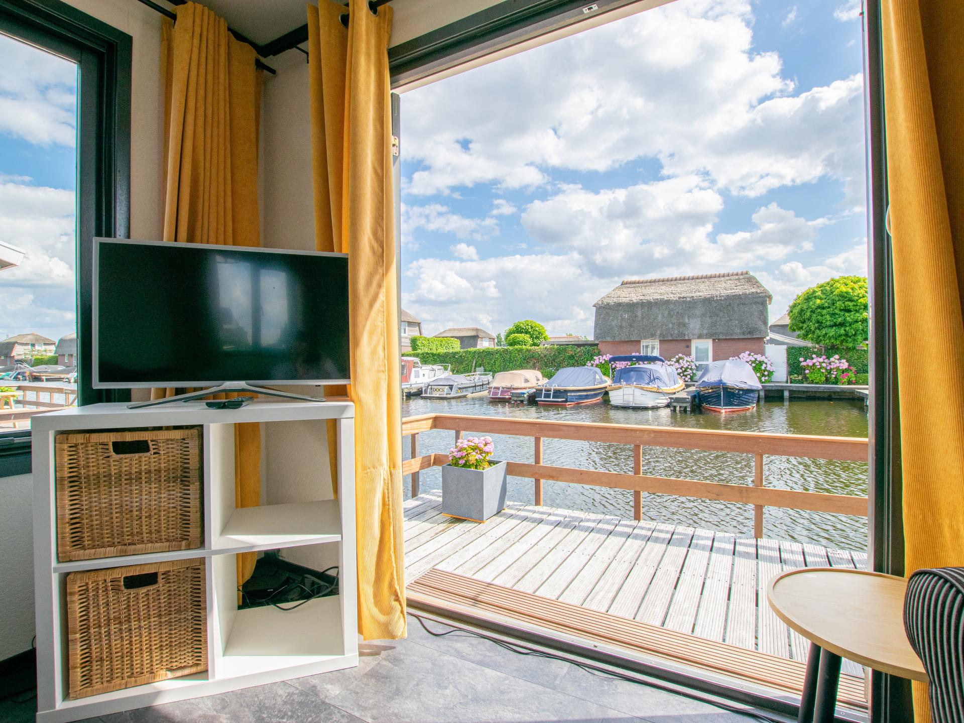 Chalet aan het water met aanlegsteiger in Breukelen, 33m², 2 slaapkamers - foto 8