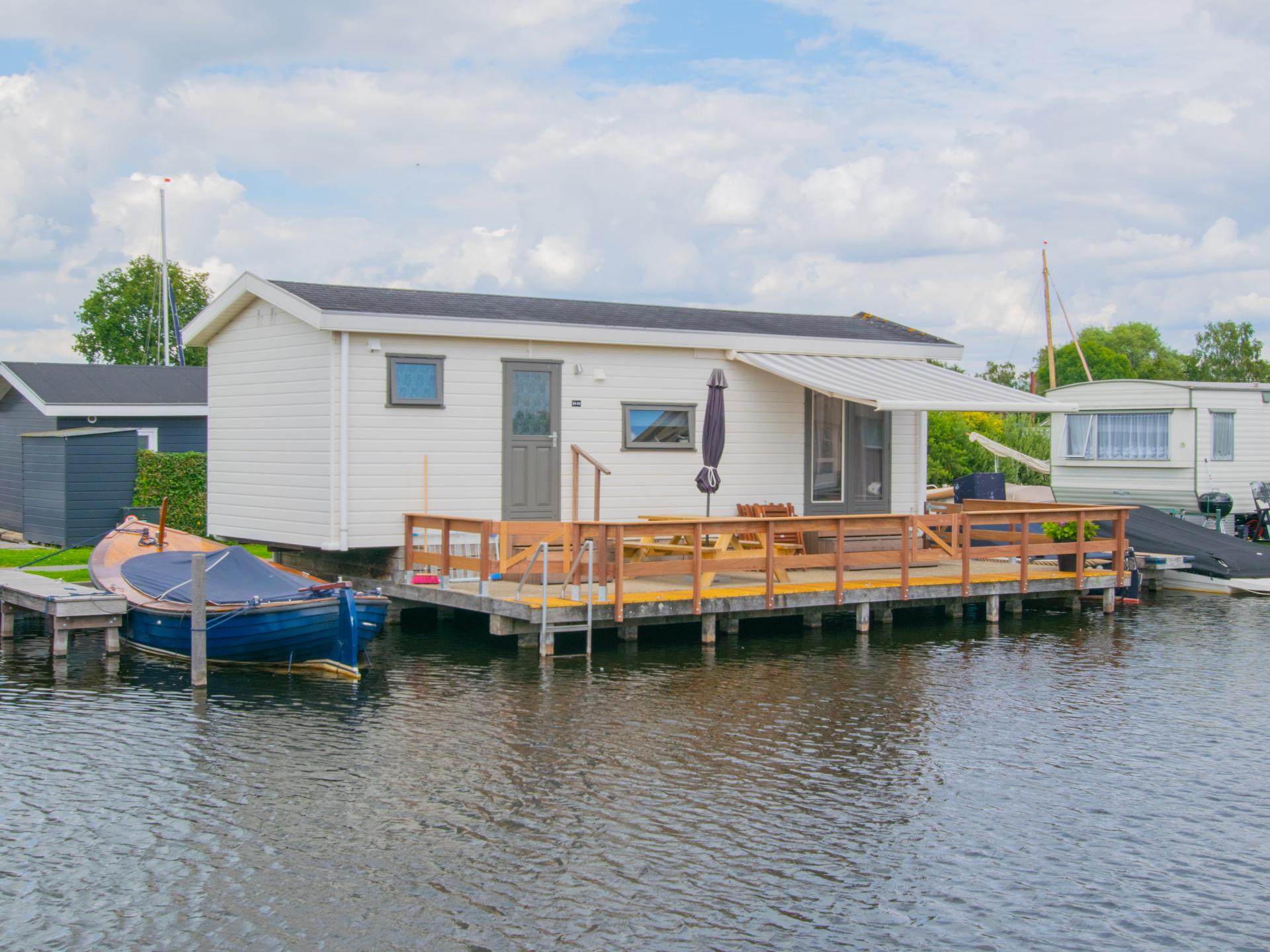 Chalet aan het water met grote veranda in Breukelen - foto 2