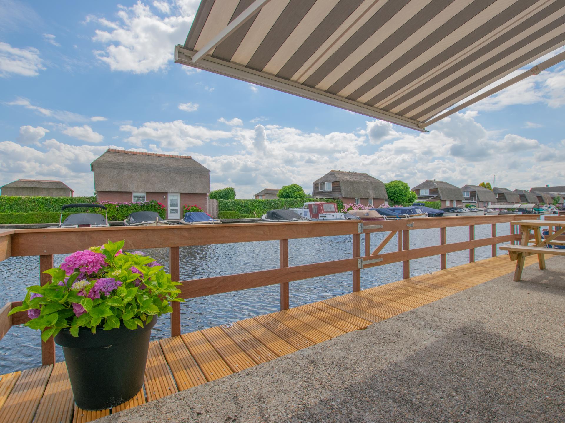 Chalet aan het water met grote veranda in Breukelen - foto 21