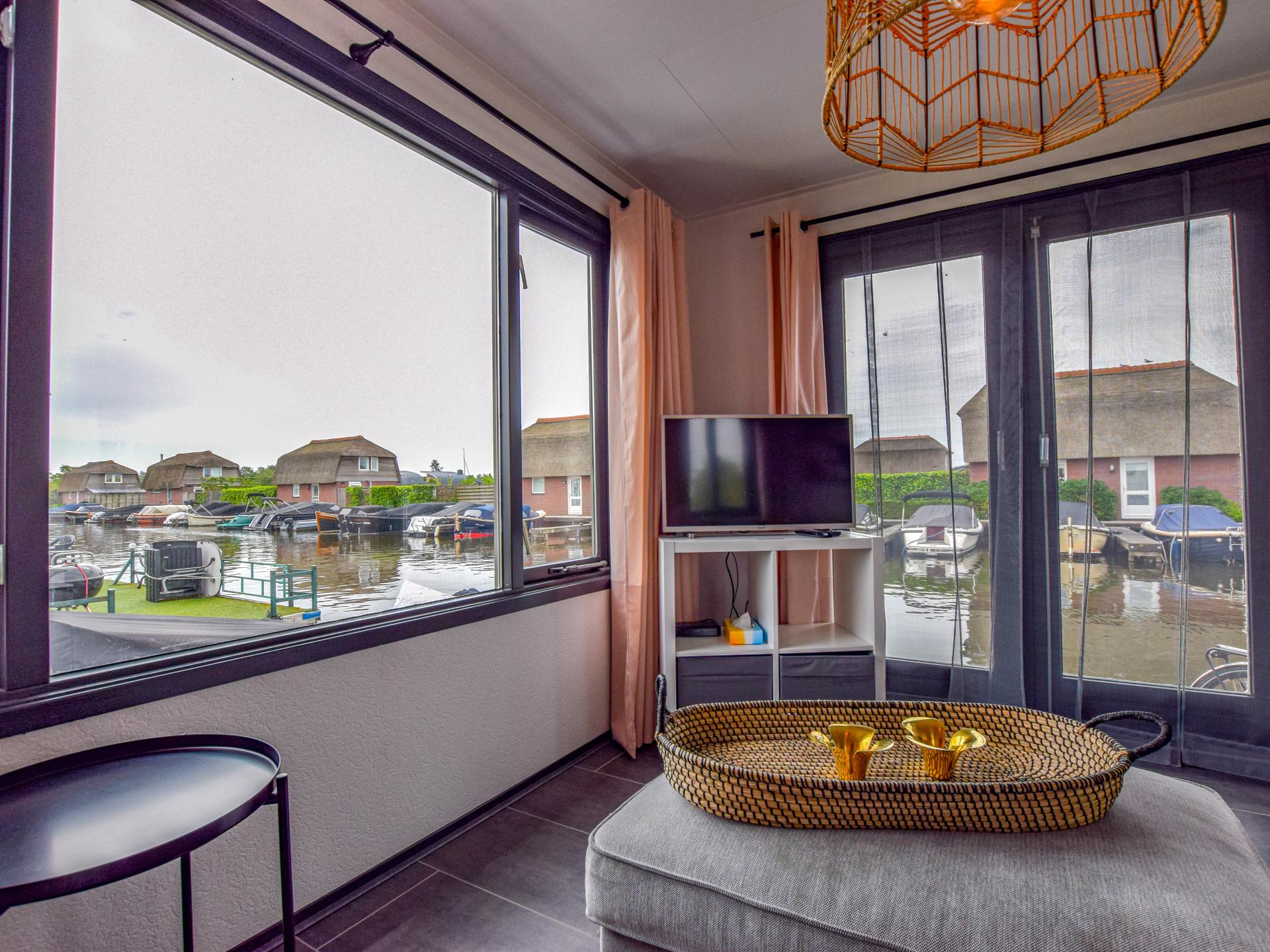 Chalet aan het water met grote veranda in Breukelen - foto 16