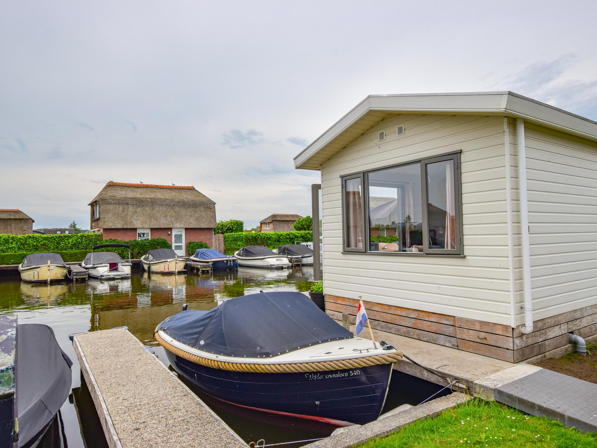 Chalet aan het water met grote veranda in Breukelen - foto 19