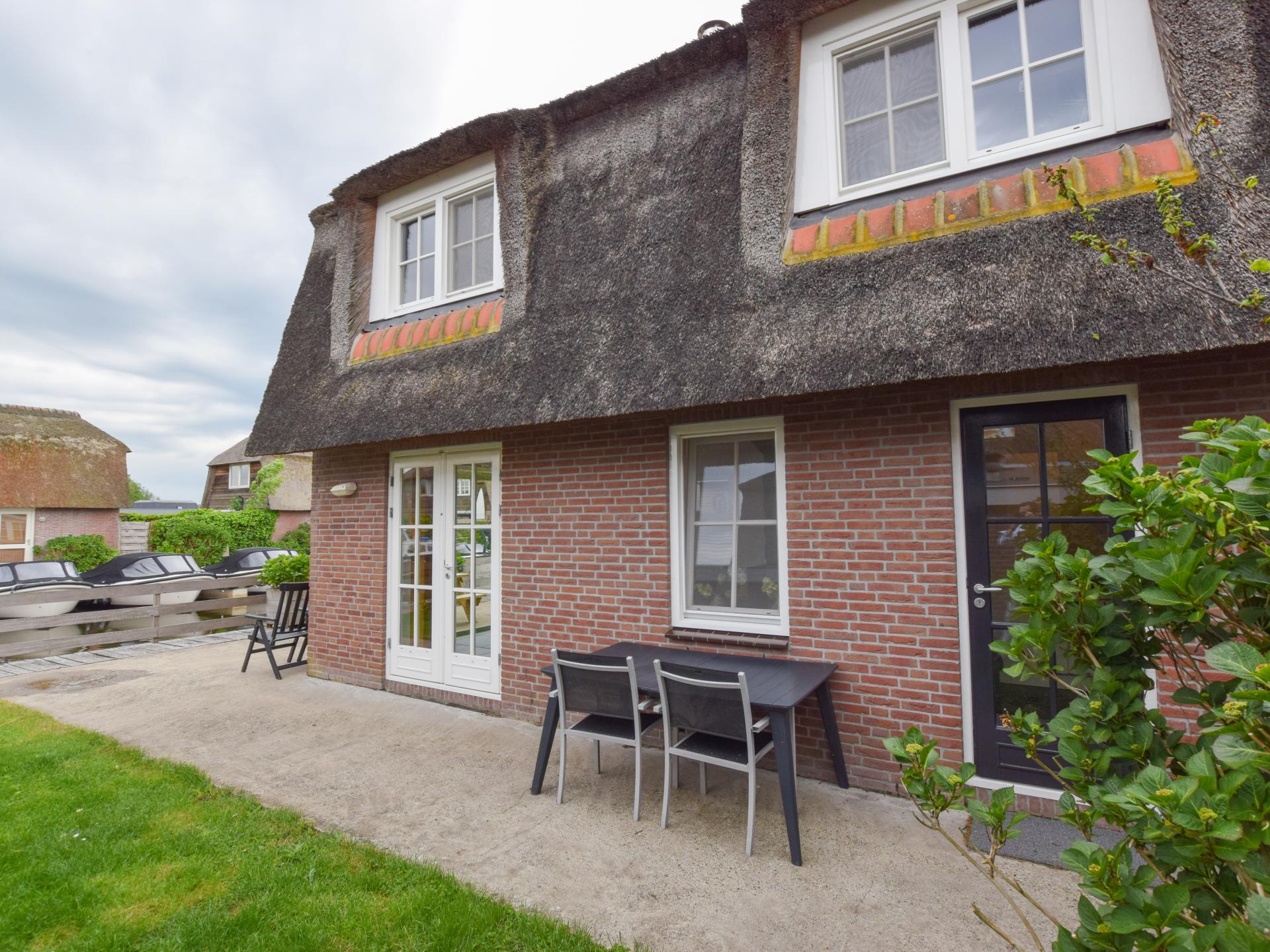 Vrijstaand vakantiehuis met privéterras aan het water in Breukelen - foto 27
