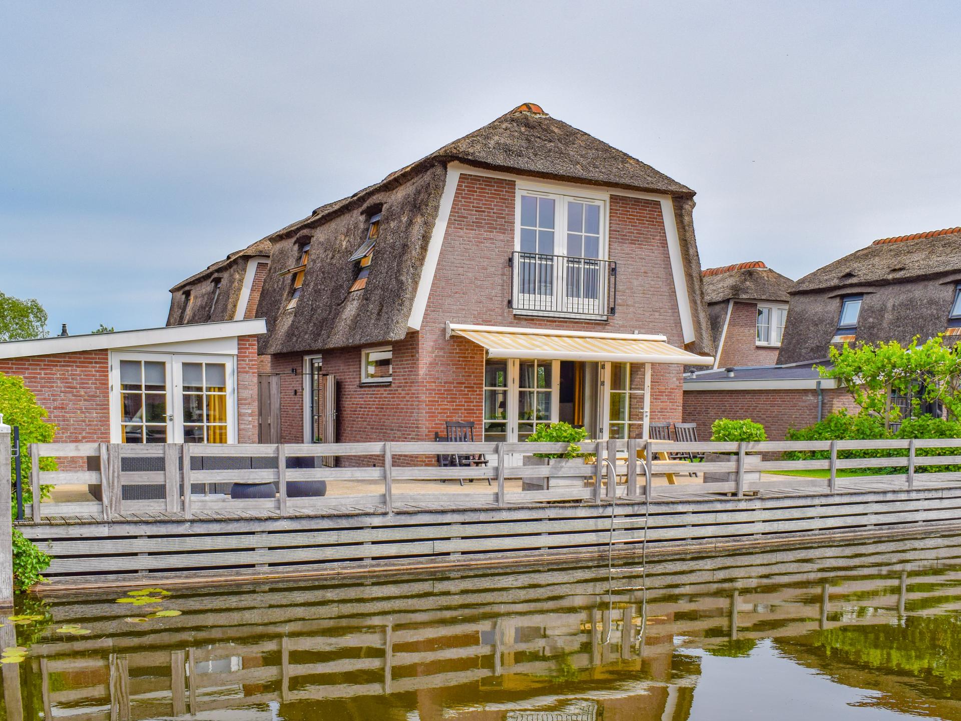Vrijstaand vakantiehuis met privéterras aan het water in Breukelen - foto 21