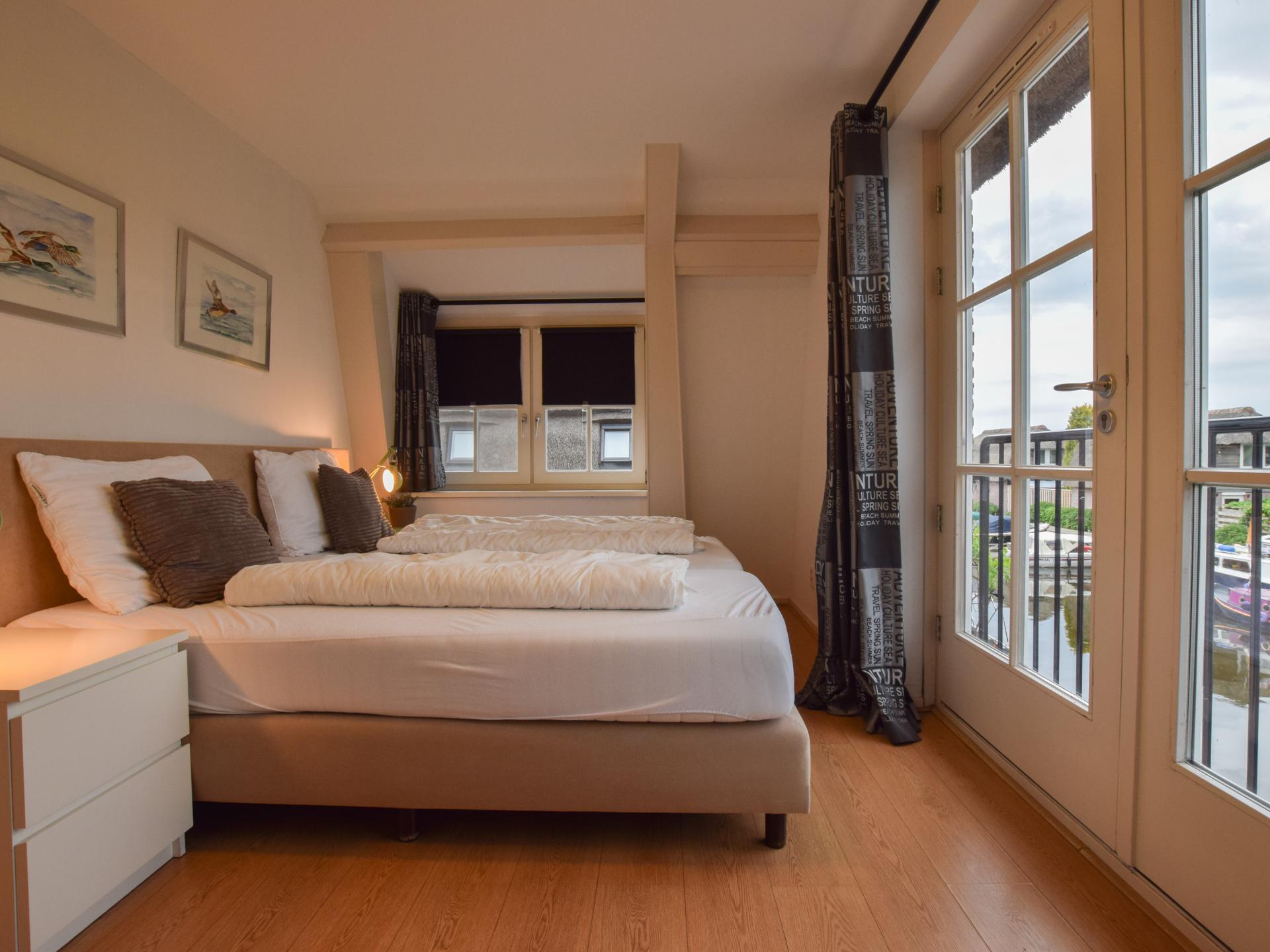 Vrijstaand vakantiehuis met privéterras aan het water in Breukelen - foto 13