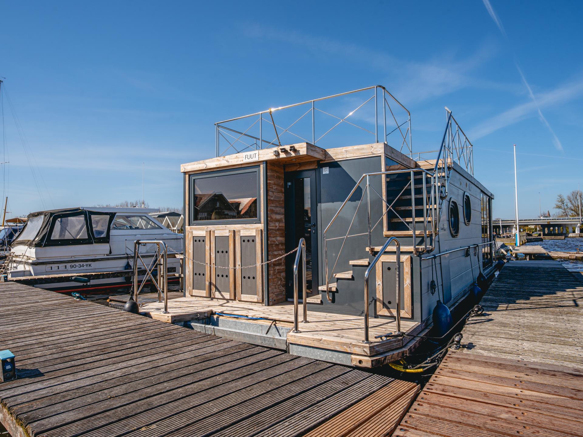 Unieke huisboot met panoramisch dakterras aan het Uitgeestermeer - foto 26