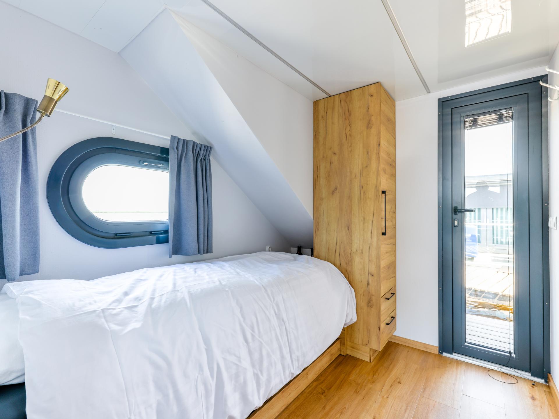Unieke huisboot met panoramisch dakterras aan het Uitgeestermeer - foto 13