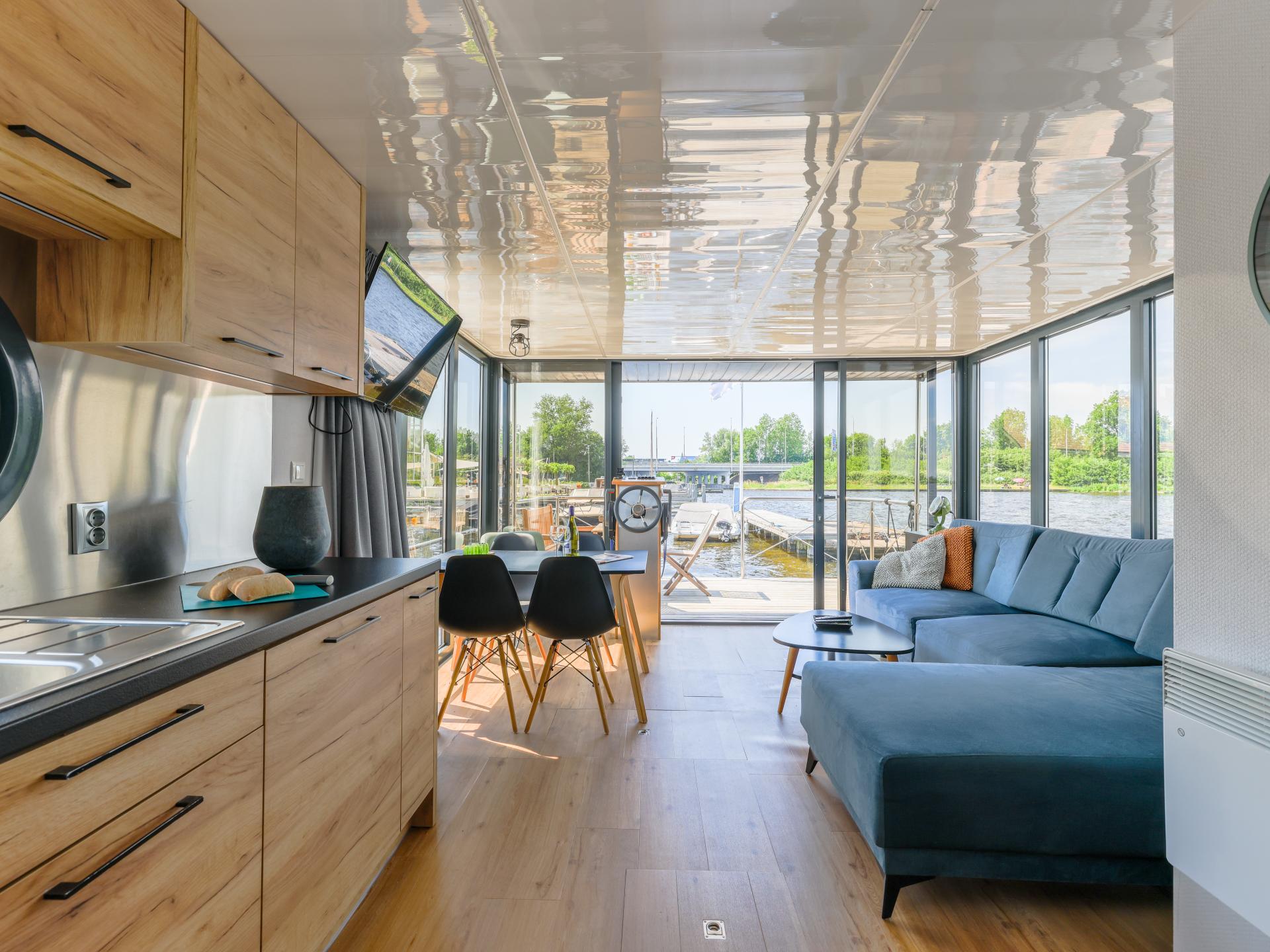 Unieke huisboot met panoramisch dakterras aan het Uitgeestermeer - foto 8